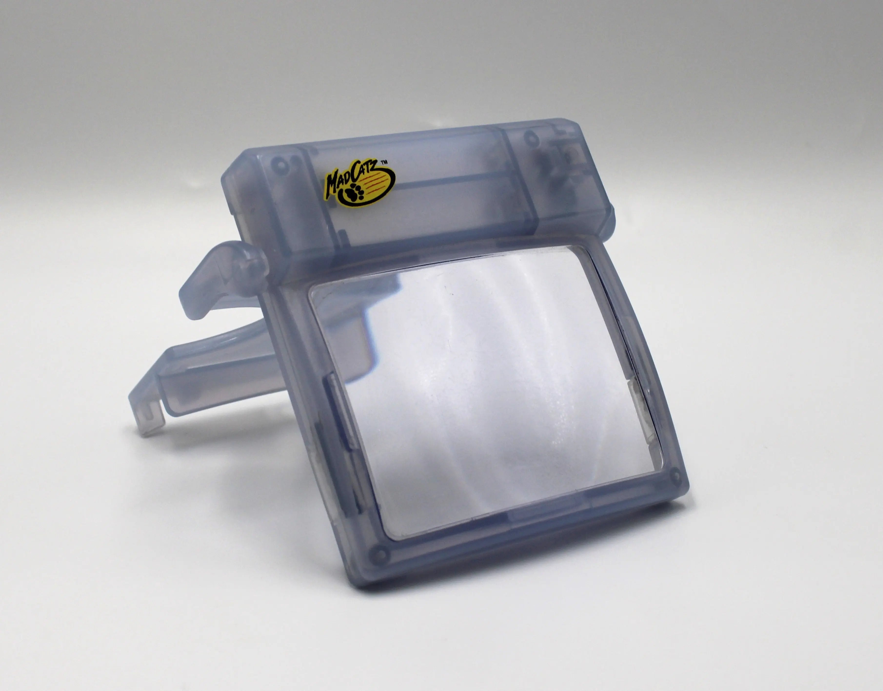 Pre-owned Glacier Ice Nintendo Game Boy Advance (GBA) Mad Catz Light & Screen Magnifier. Picture of right side angle.