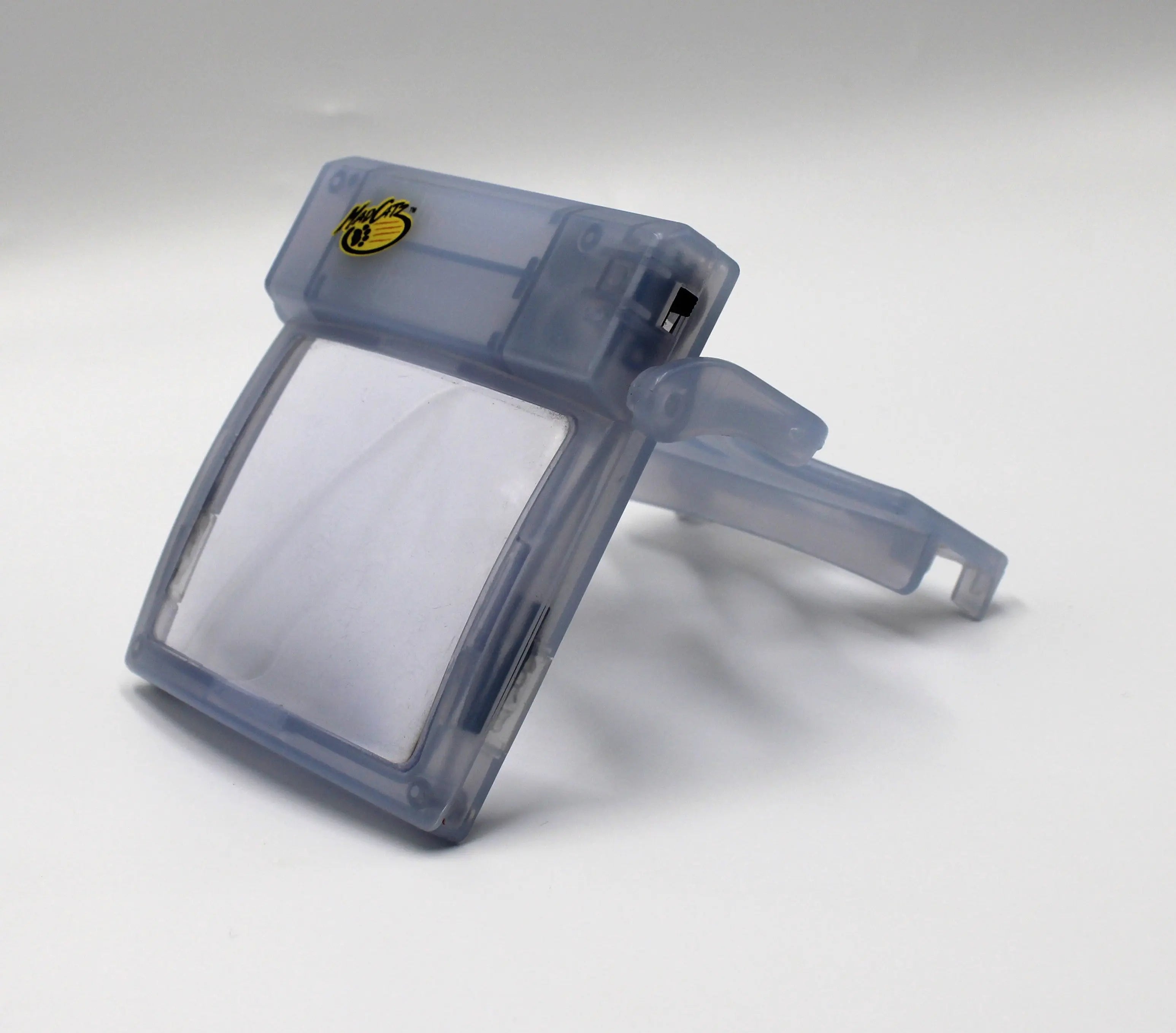 Pre-owned Glacier Ice Nintendo Game Boy Advance (GBA) Mad Catz Light & Screen Magnifier. Picture of side angle.