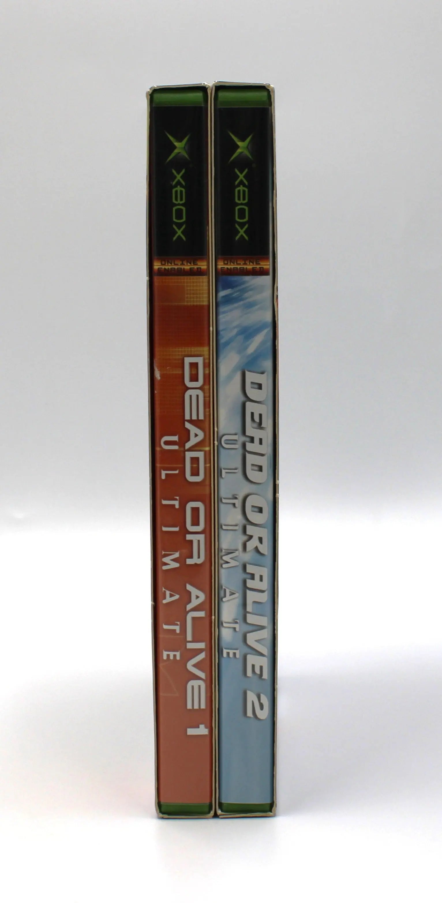 Side view of Dead or Alive Ultimate for Microsoft Xbox Original NTSC-U outer box, showing both spines with title text and design.