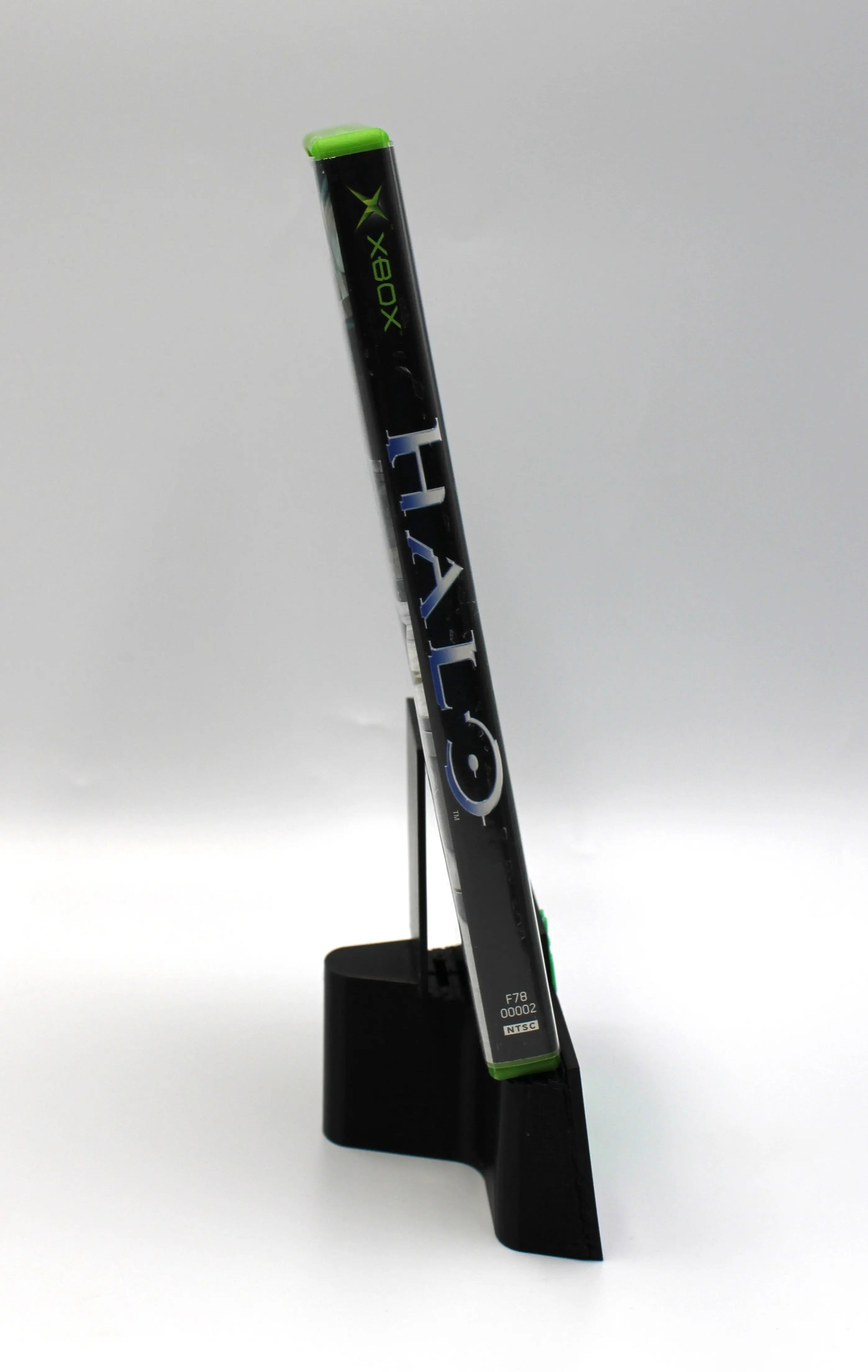 Spine view of Halo: Combat Evolved for Microsoft Xbox Original NTSC-U game case, showing title text and case alignment.