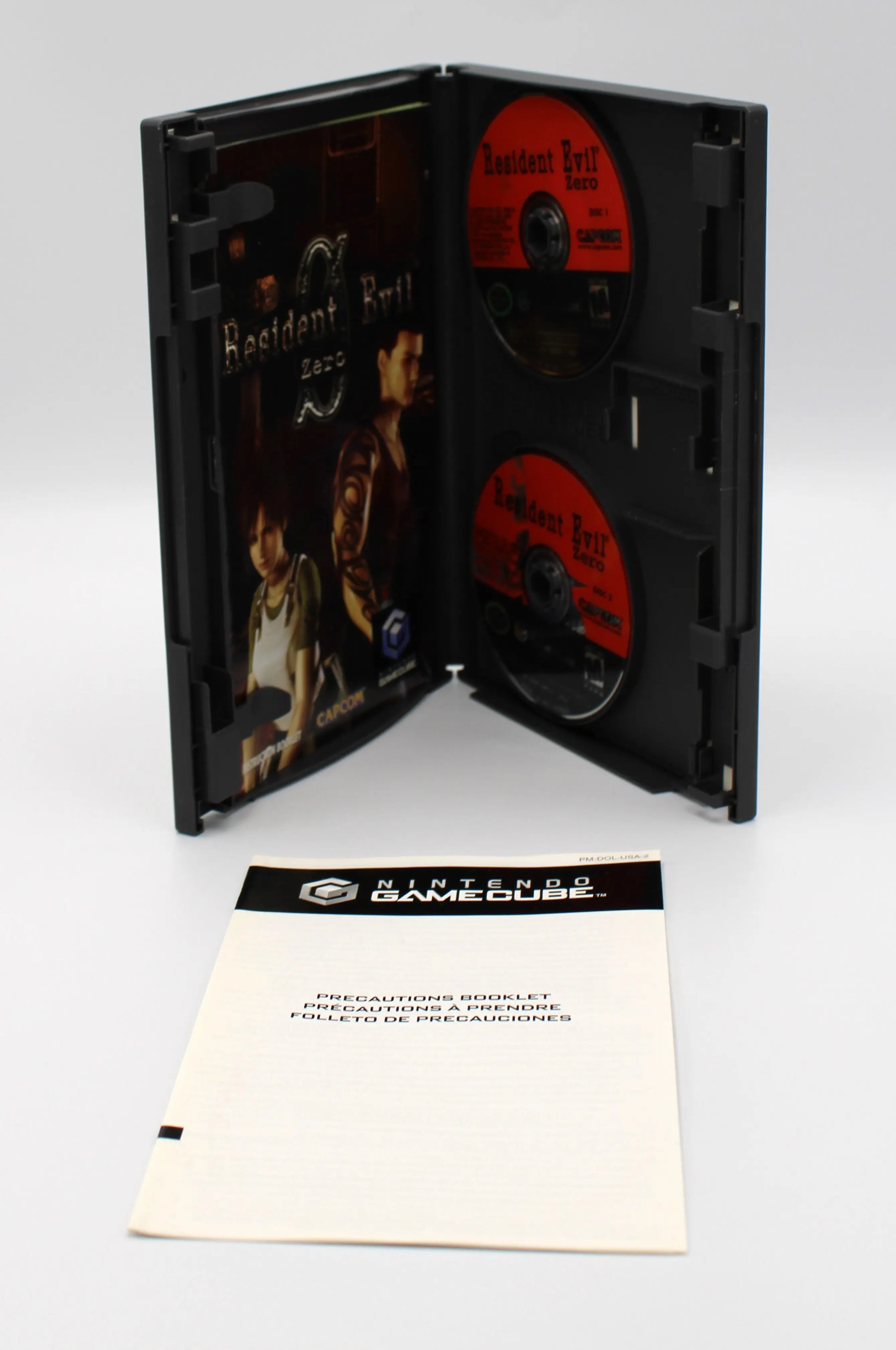 For sale is Resident Evil Zero NTSC-U for Nintendo GameCube. 2 Disc set. CIB complete in box. See picture of opened case with inserts and authentic game discs.