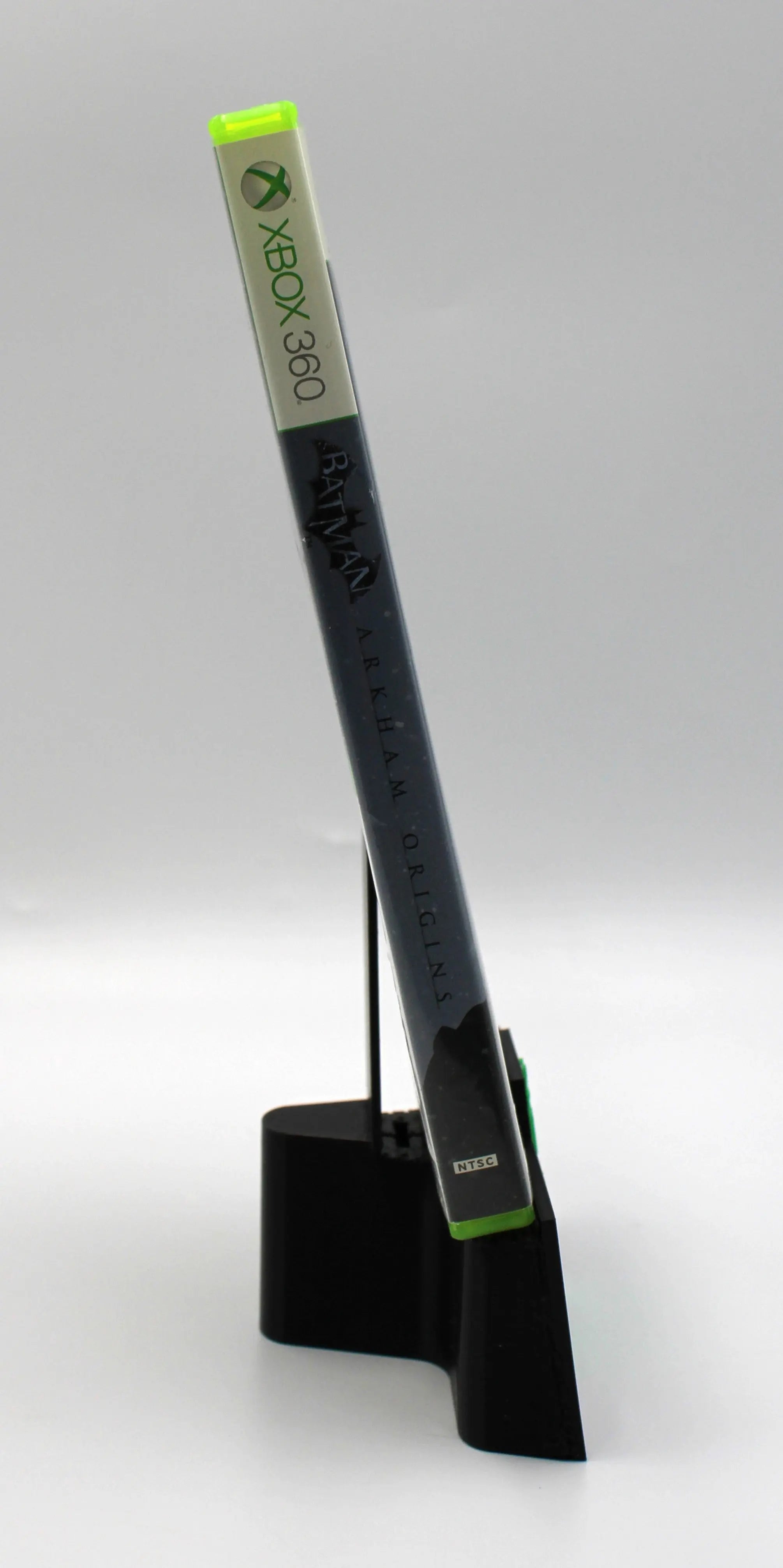 Spine view of Batman: Arkham Origins for Microsoft Xbox 360 NTSC-U game case, showing title text and case alignment.