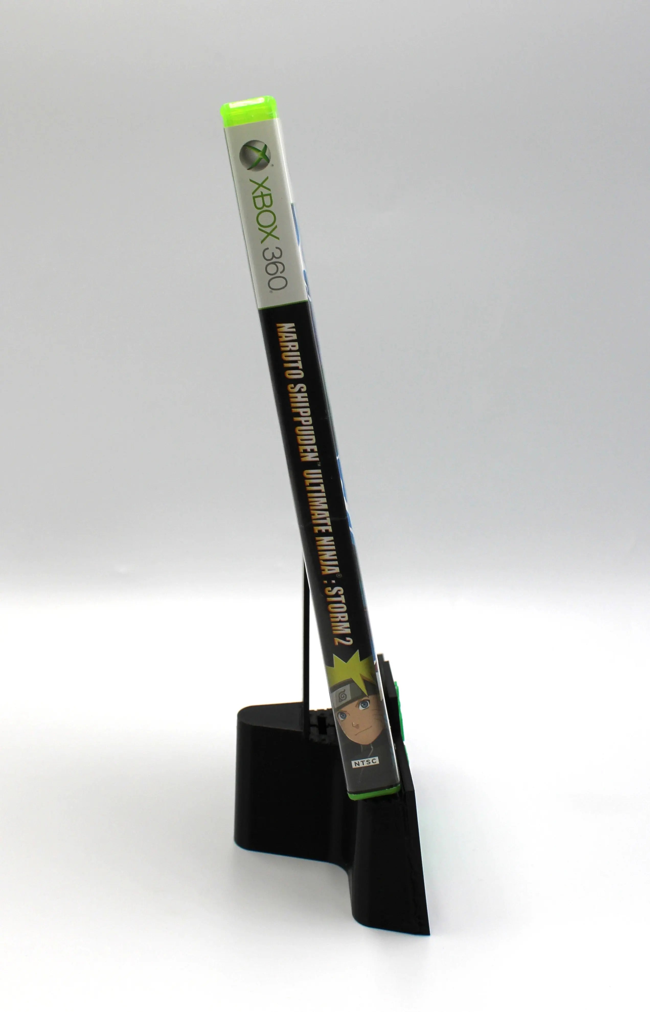 Spine view of Naruto: Rise of a Ninja for Microsoft Xbox 360 NTSC-U game case, showing title text and case alignment.