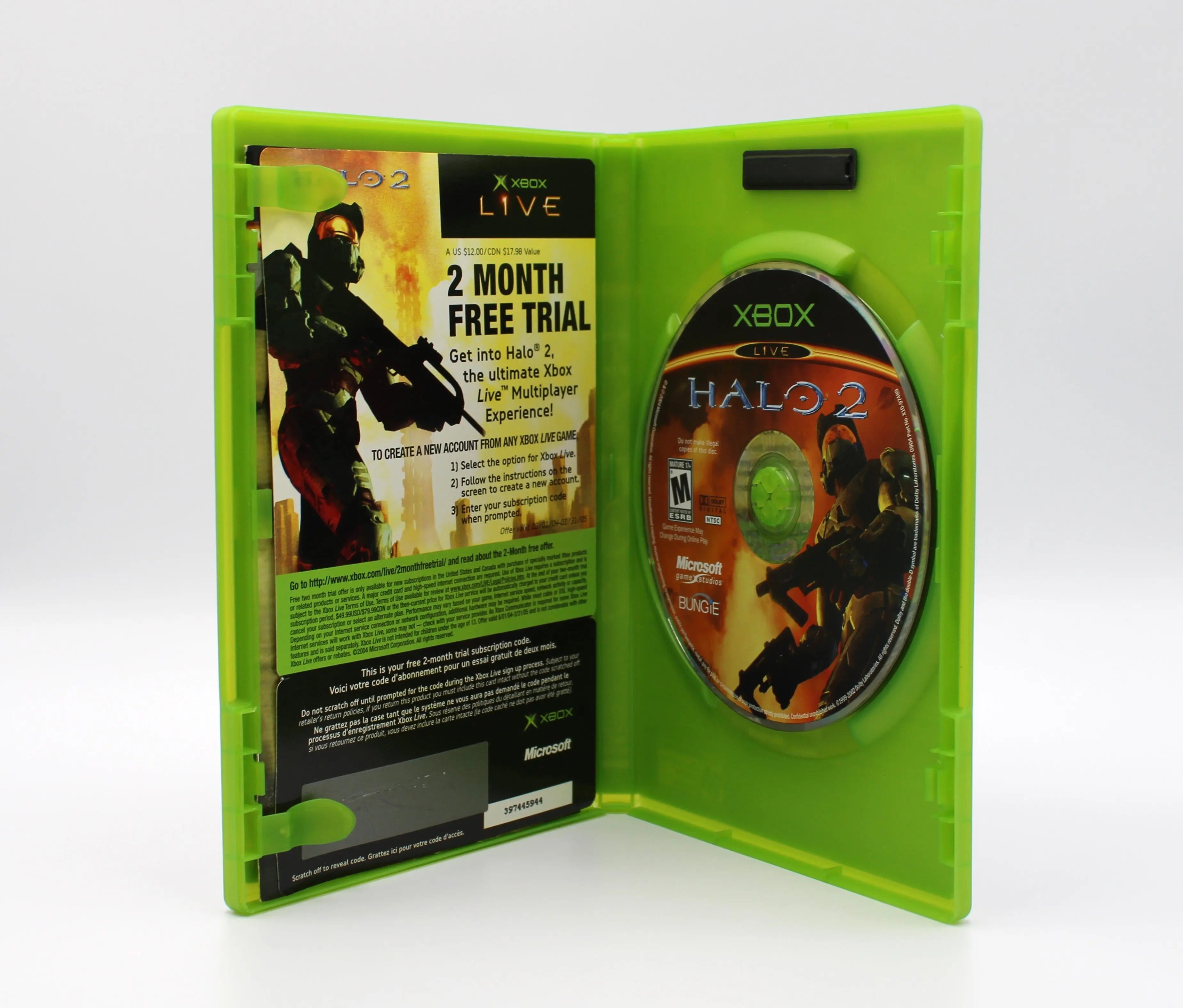 Open case view of Halo 2 for Microsoft Xbox Original NTSC-U, showing inserts placement and game disc secured in tray.
