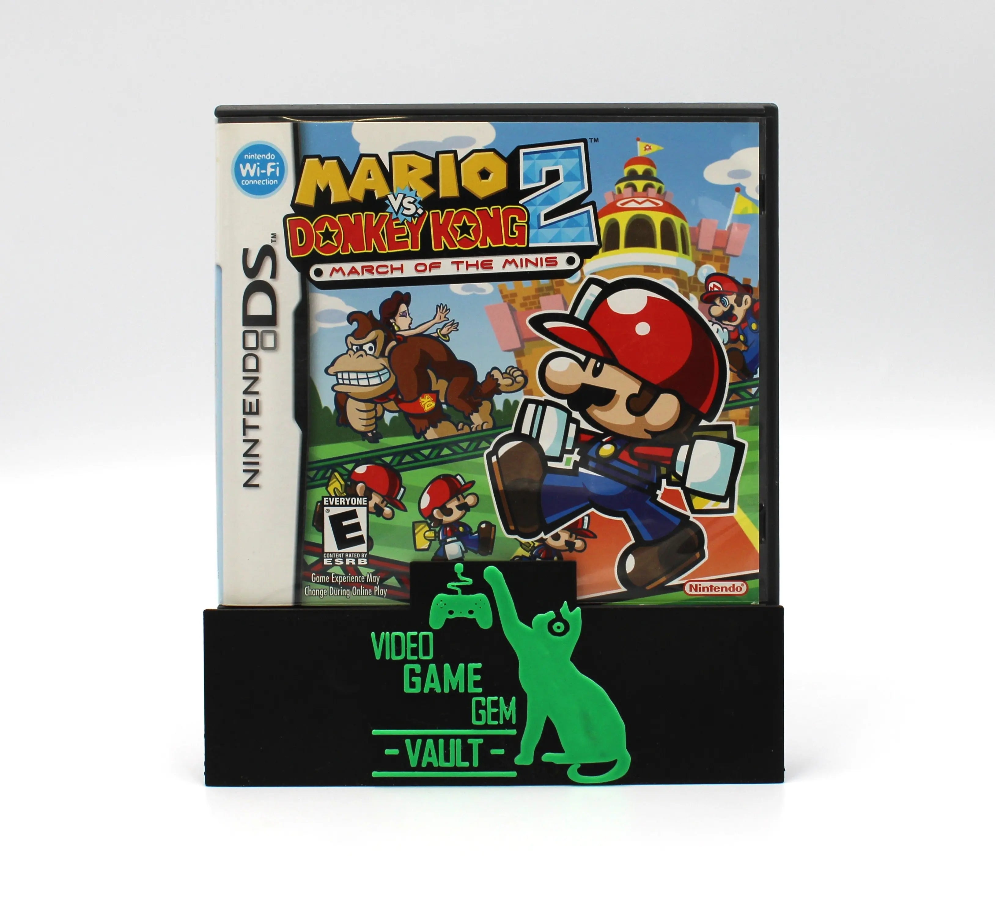 Front case image view of NTSC-U Mario vs. Donkey Kong 2: March of the Minis complete in box for Nintendo DS. (2006) CIB with all Inserts. Showing front case cover with ESRB E rating, title text, and Mario images.