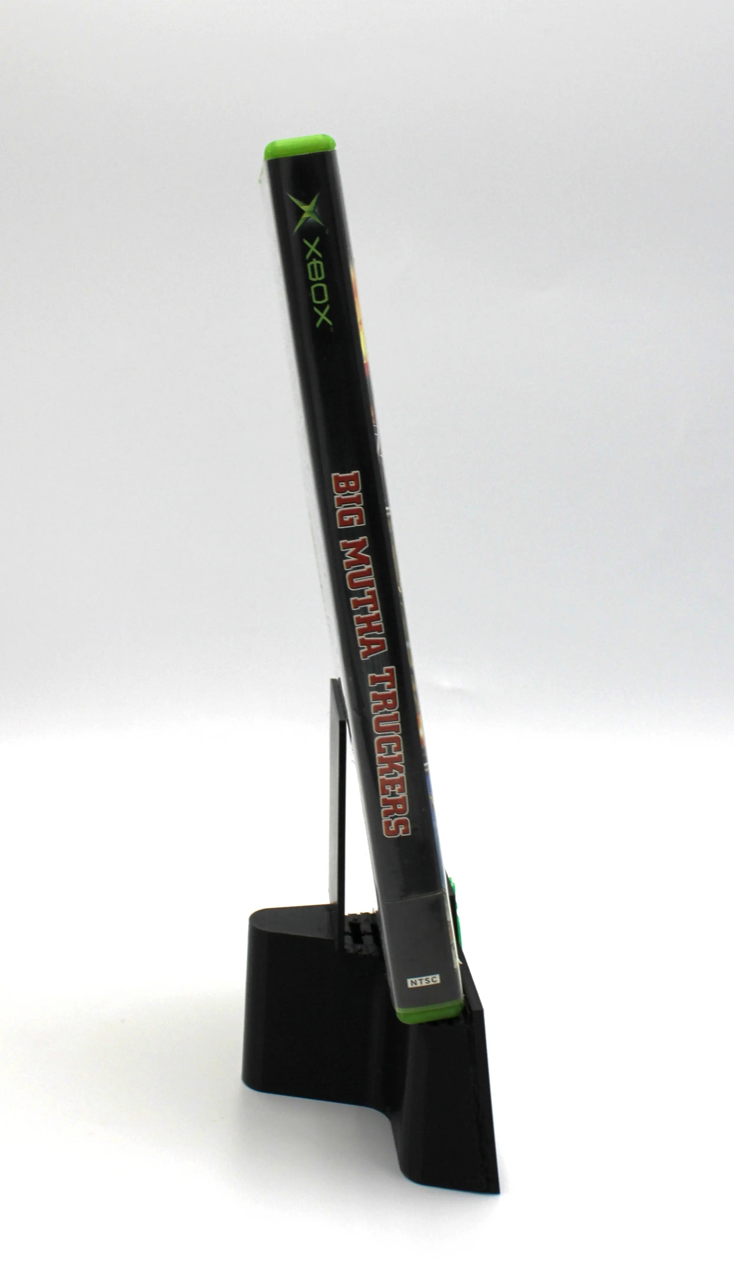 Spine view of Big Mutha Truckers for Microsoft Xbox Original NTSC-U game case, showing title text and case alignment.