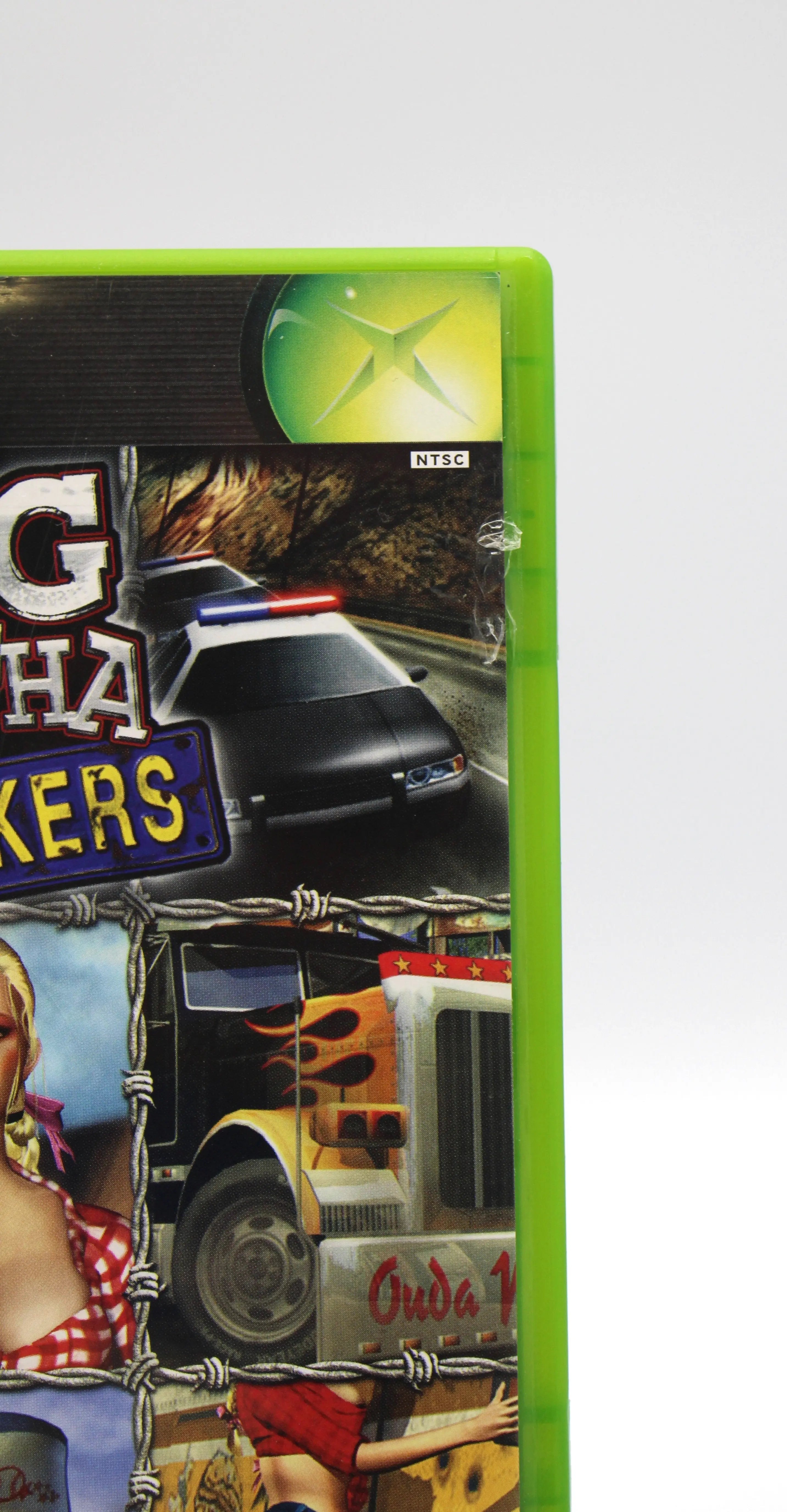 Front cover top right view of Big Mutha Truckers for Microsoft Xbox Original NTSC-U game case, showing very minor cosmetic wear to case.