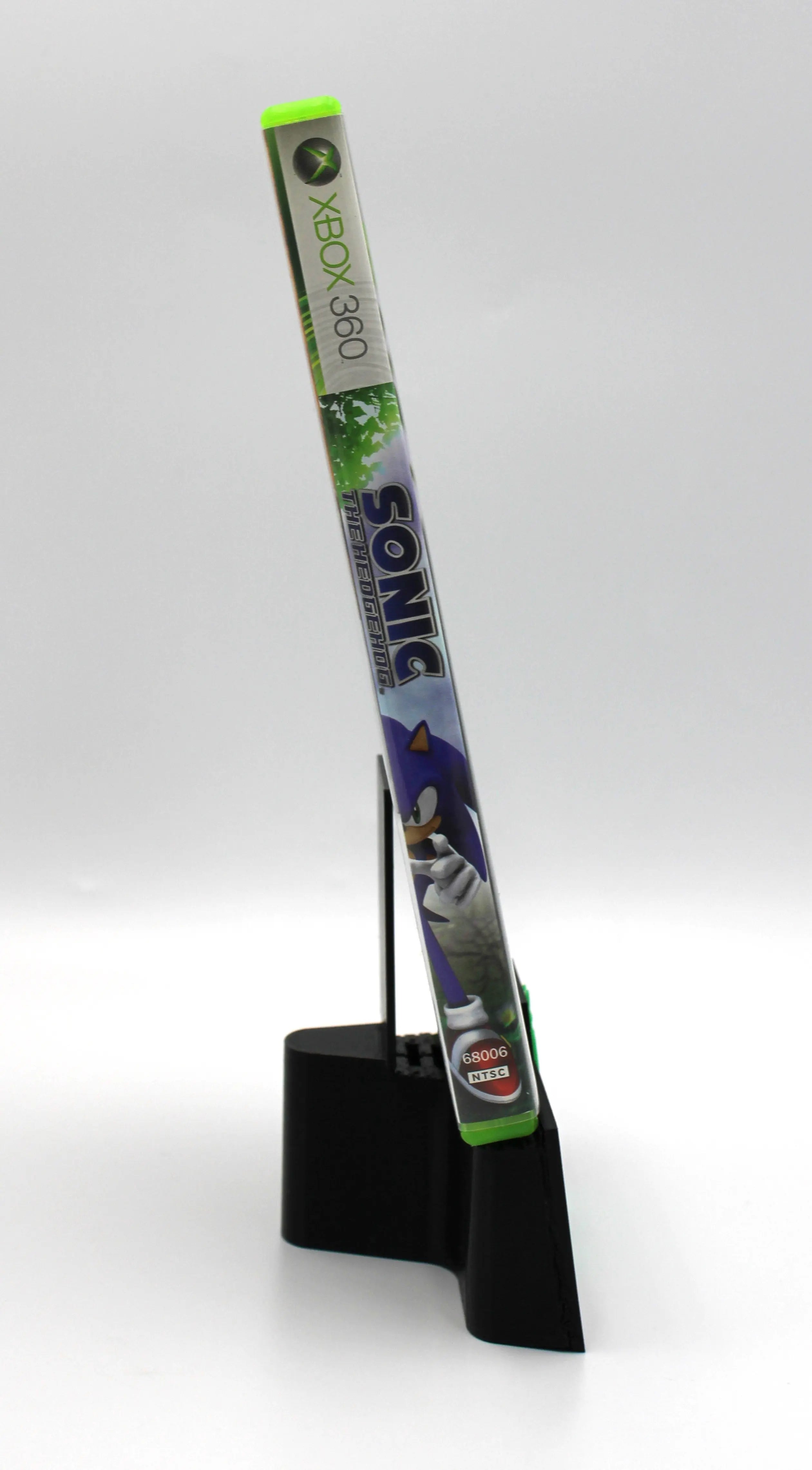 Spine view of Sonic the Hedgehog Black Label for Microsoft Xbox 360 NTSC-U game case, showing title text and case alignment.