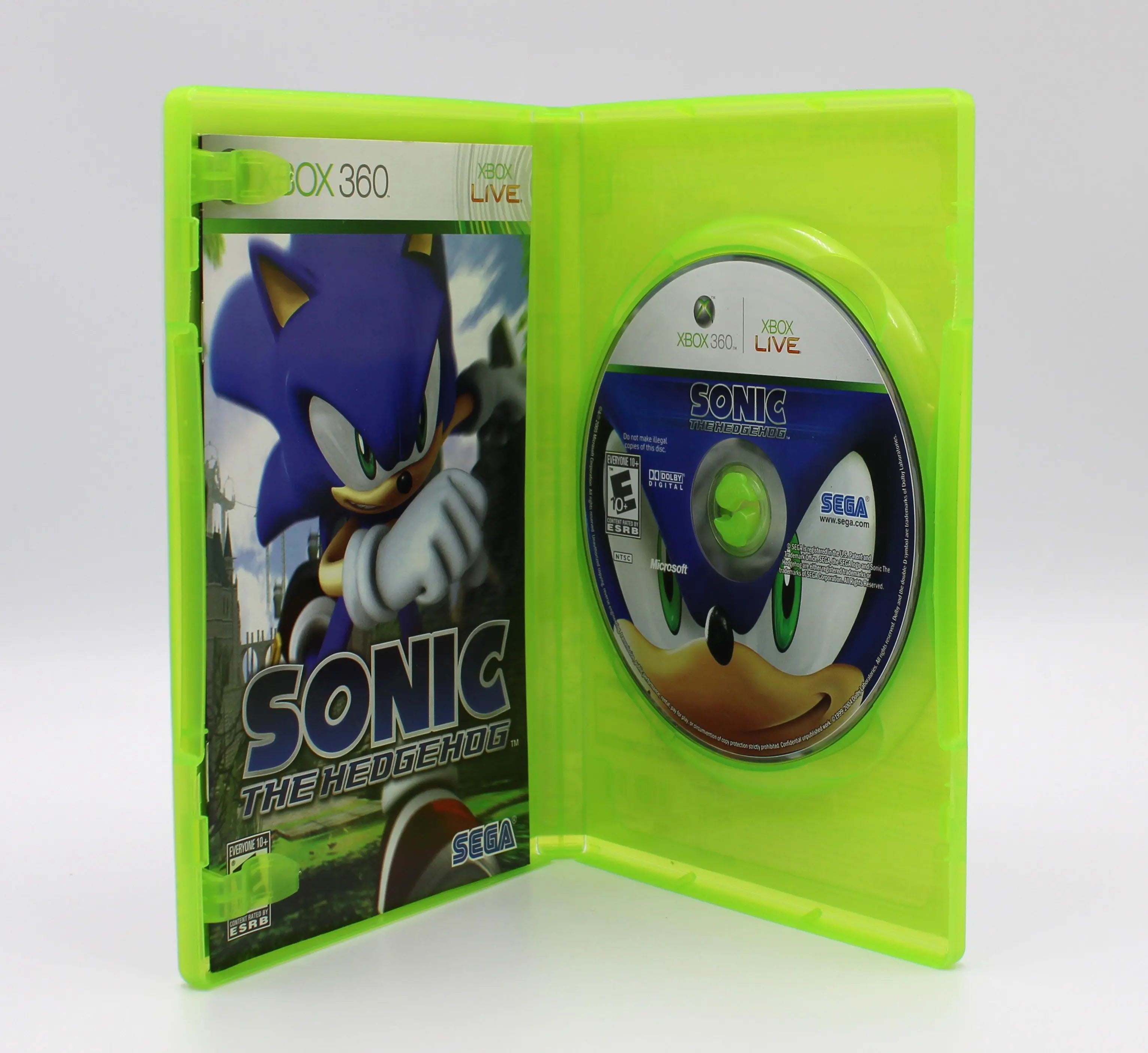 Open case view of Sonic the Hedgehog  Black Label for Microsoft Xbox 360 NTSC-U, showing manual placement and game disc secured in tray.