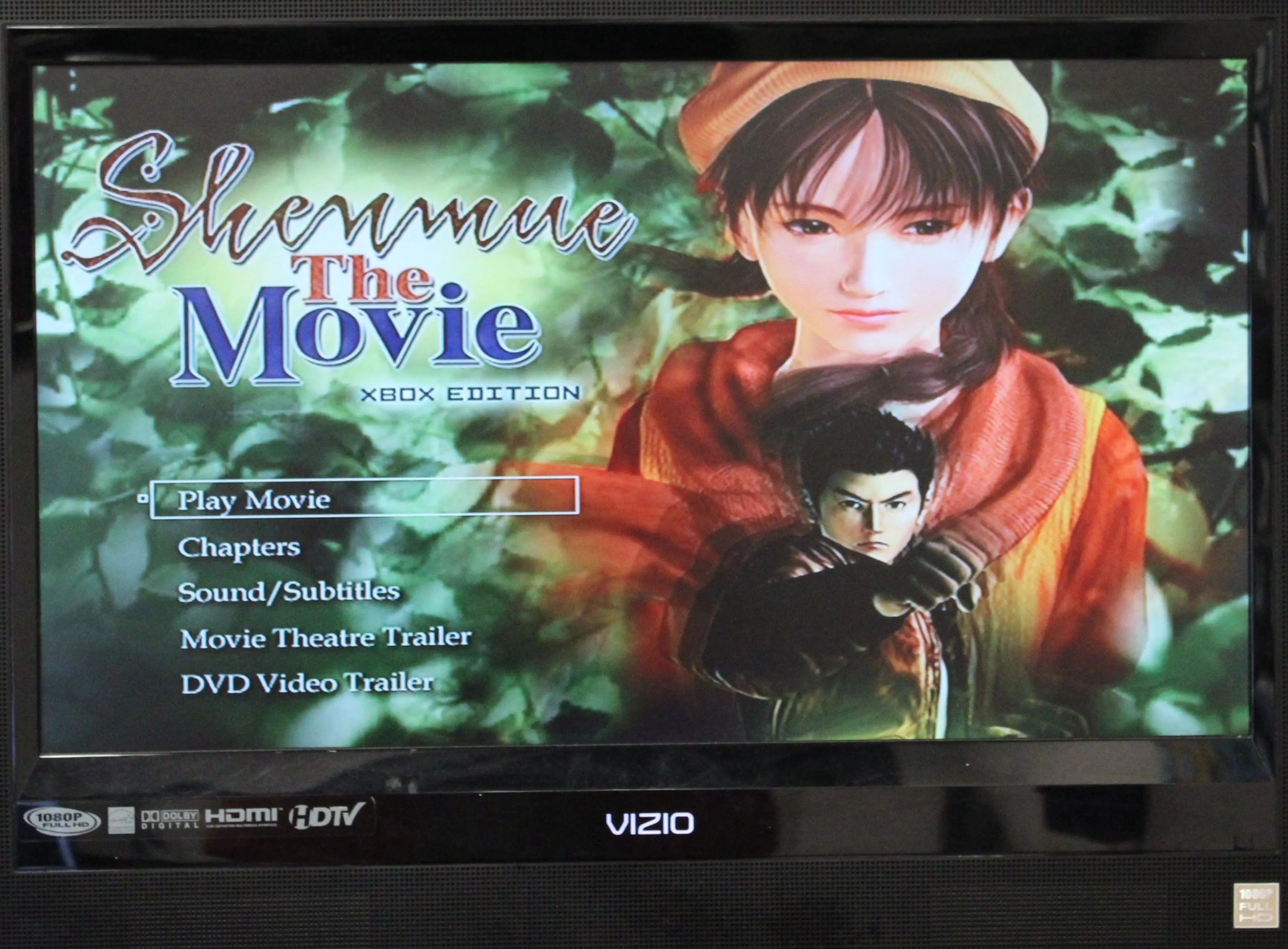 Bonus DVD movie image of Shenmue II for Microsoft Xbox Original NTSC-U, showing promotional visuals from the Shenmue story movie disc main menu with options.