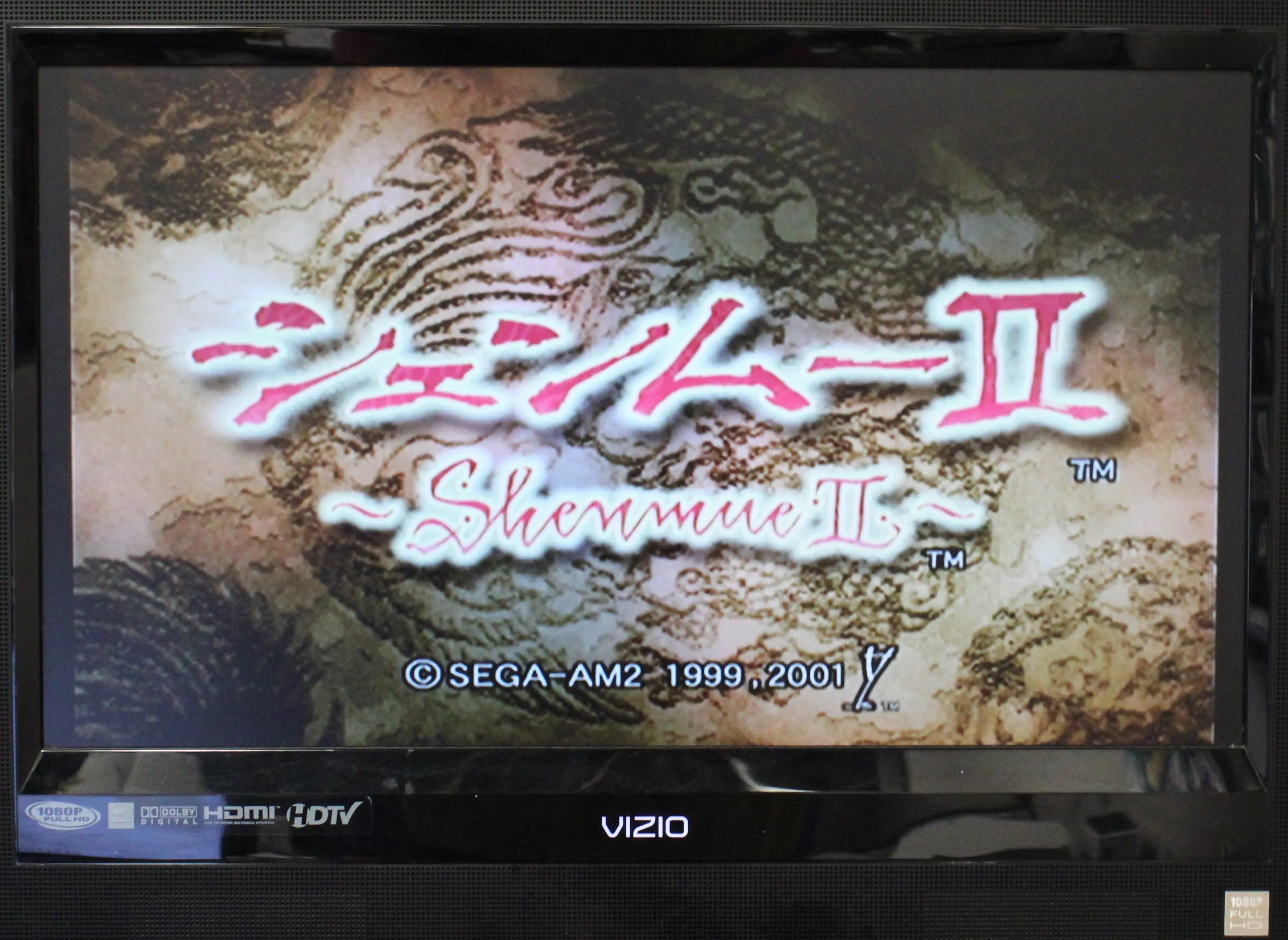 Gameplay screenshot image of Shenmue II for Microsoft Xbox Original NTSC-U, showing main menu with game title and Sega-AM2 1999 2001