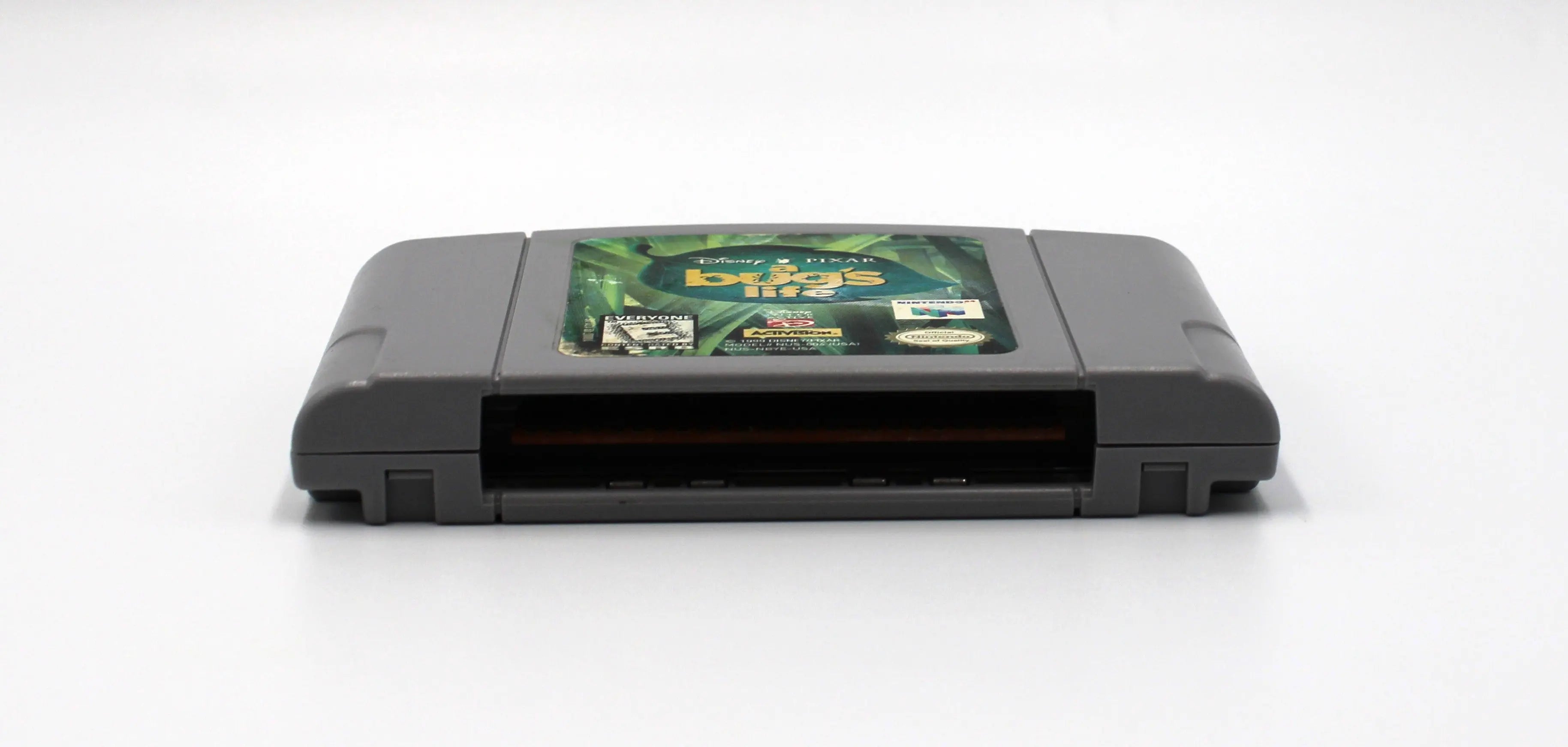 Bottom of cartridge view of NTSC-U copy of Disney's A Bug's Life for Nintendo 64, N64. Released in 1999. See picture of polished pins and cartridge condition.