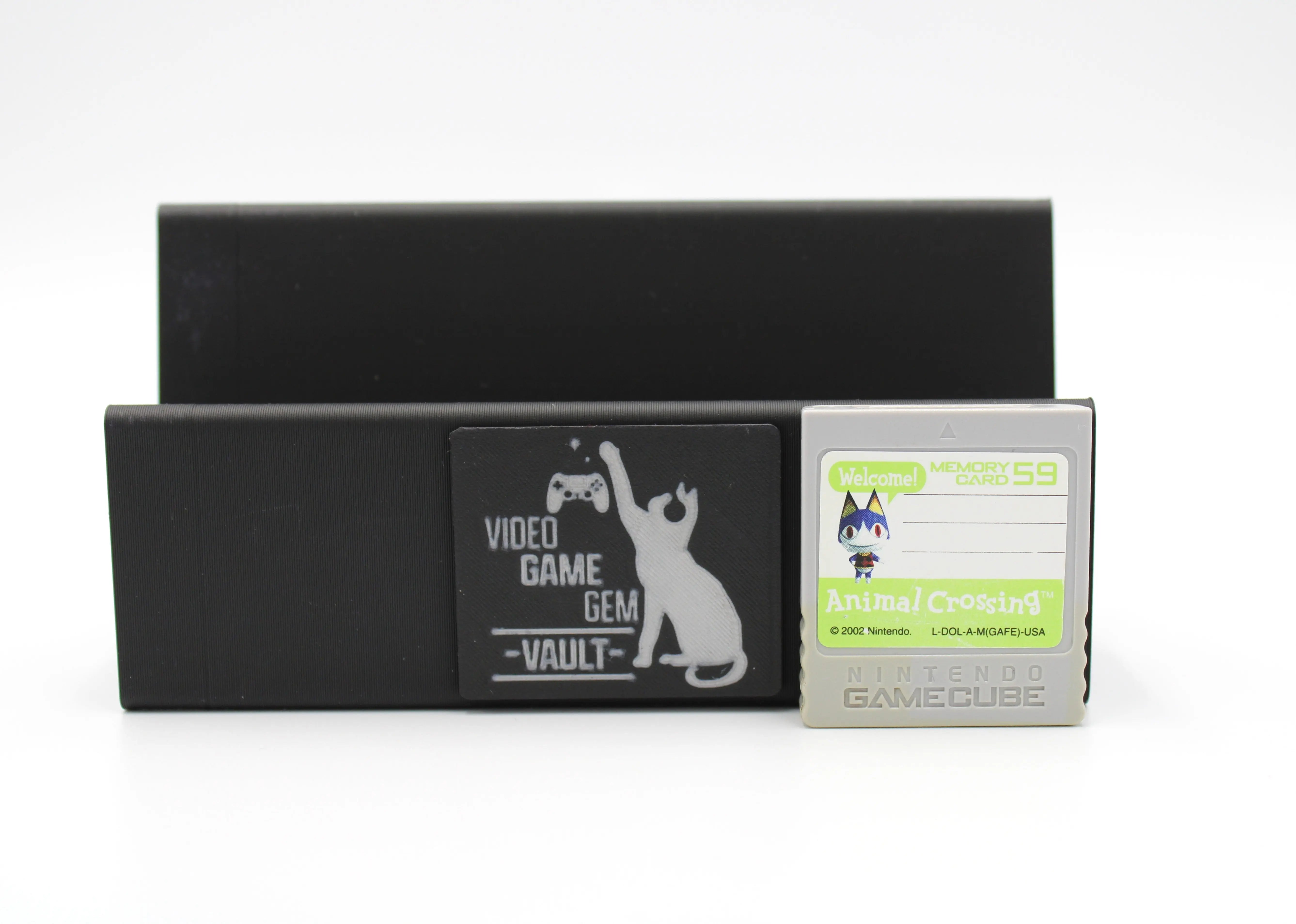 Front image of 2002 released NTSC-U of OEM Animal Crossing Memory Card for Nintendo GameCube – 59 Blocks (DOL-008). Displaying authentic grey Animal Crossing memory card front label with neon green and white colors, game text and product code on a clean white background.