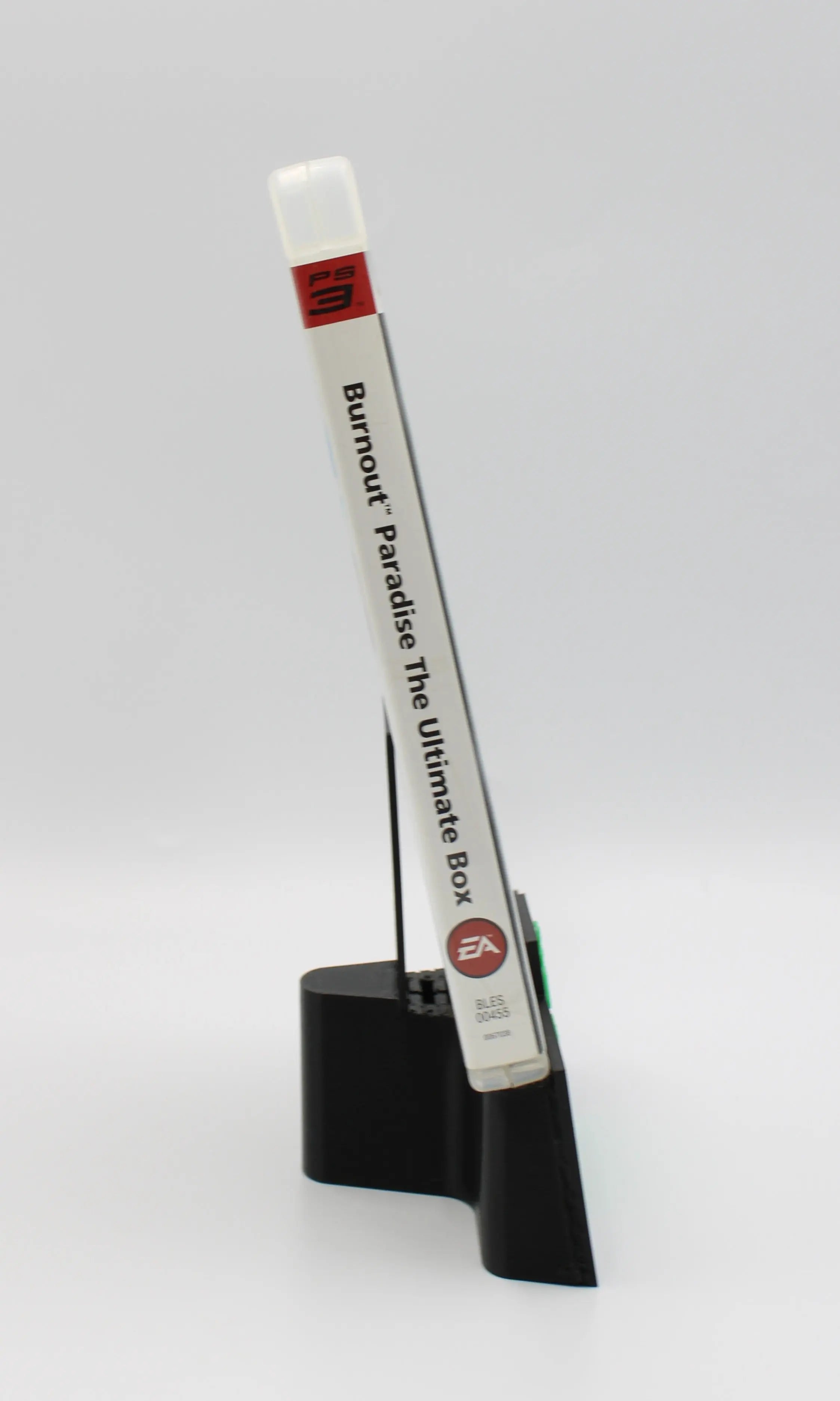 Spine view of Burnout Paradise: The Ultimate Box for PS3 PAL [Region Free], with game title printed for easy shelf visibility.