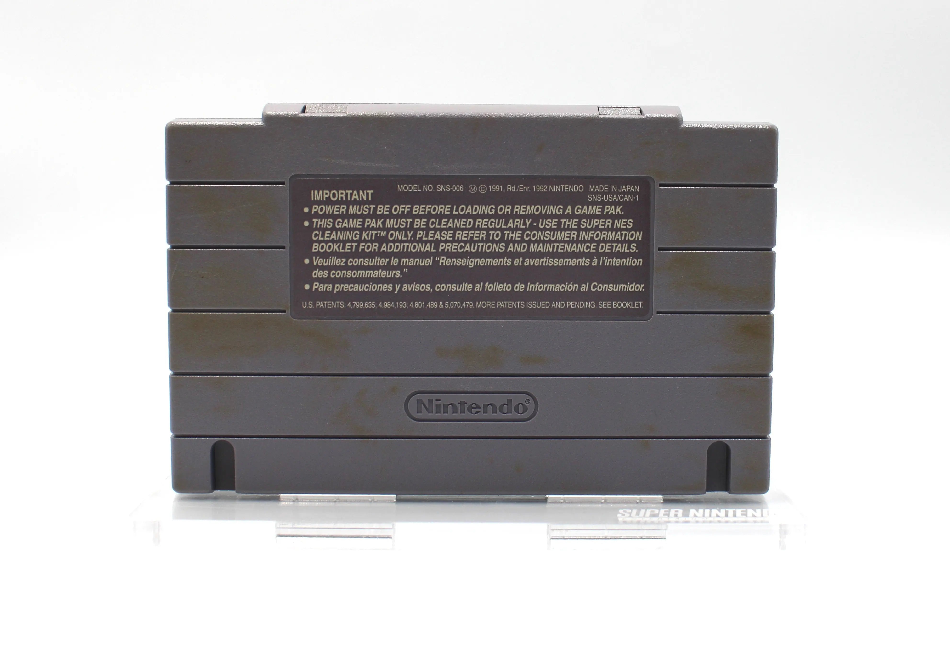 Back View of NTSC-U Capcom's Soccer Shootout for Super Nintendo SNES. (1994) Authentic Game Cartridge. See back label and moderate discoloration from age.