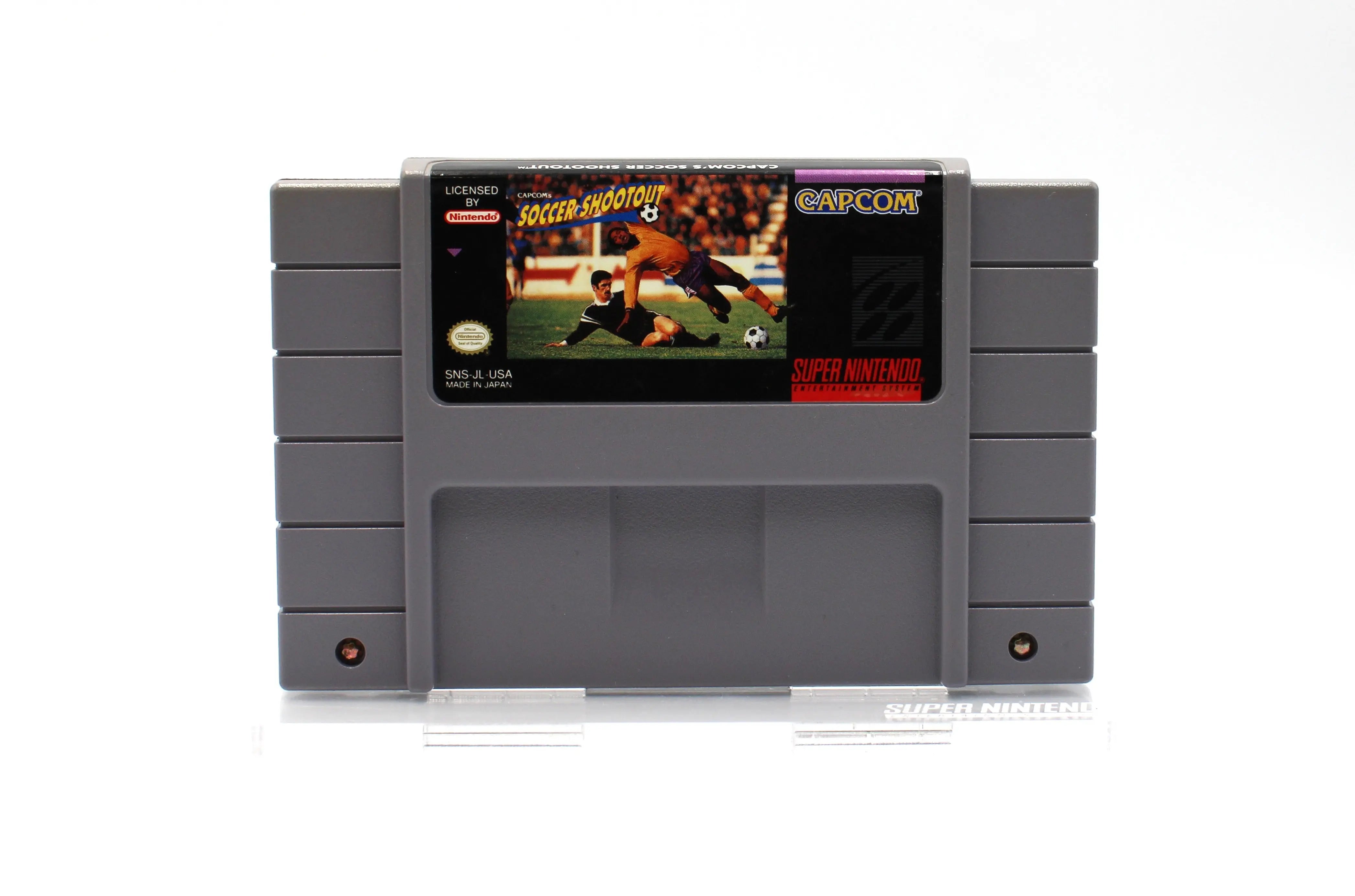 Front View of NTSC-U Capcom's Soccer Shootout for Super Nintendo SNES. (1994) Authentic Game Cartridge. Front label, Title Text, and Condition.