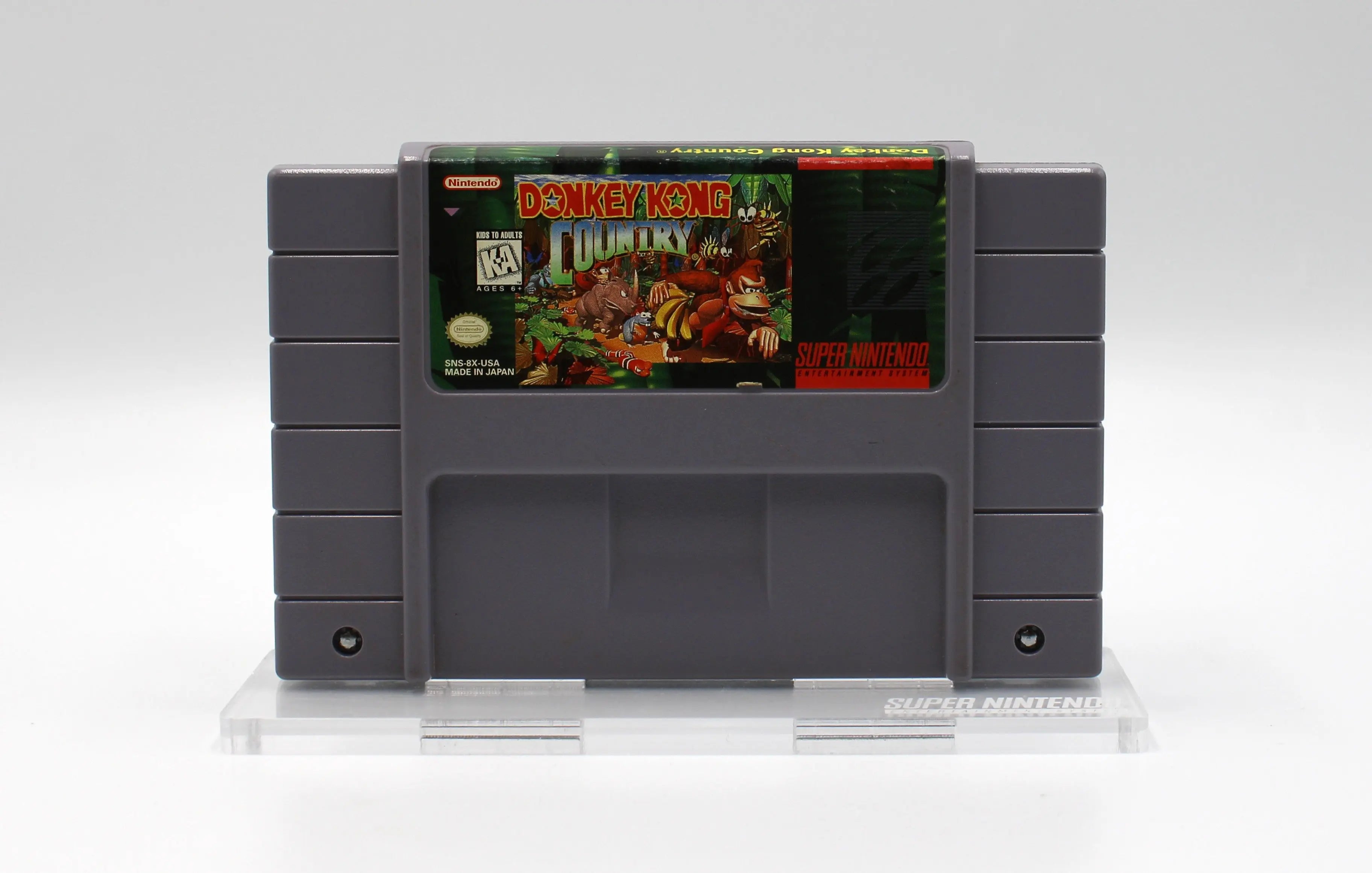Front shell view of Donkey Kong Country for Super Nintendo SNES – Authentic Game Cartridge, New Save Battery (1994) NTSC‑U, showing original label art, “Super Nintendo” molding, and clean shell condition.