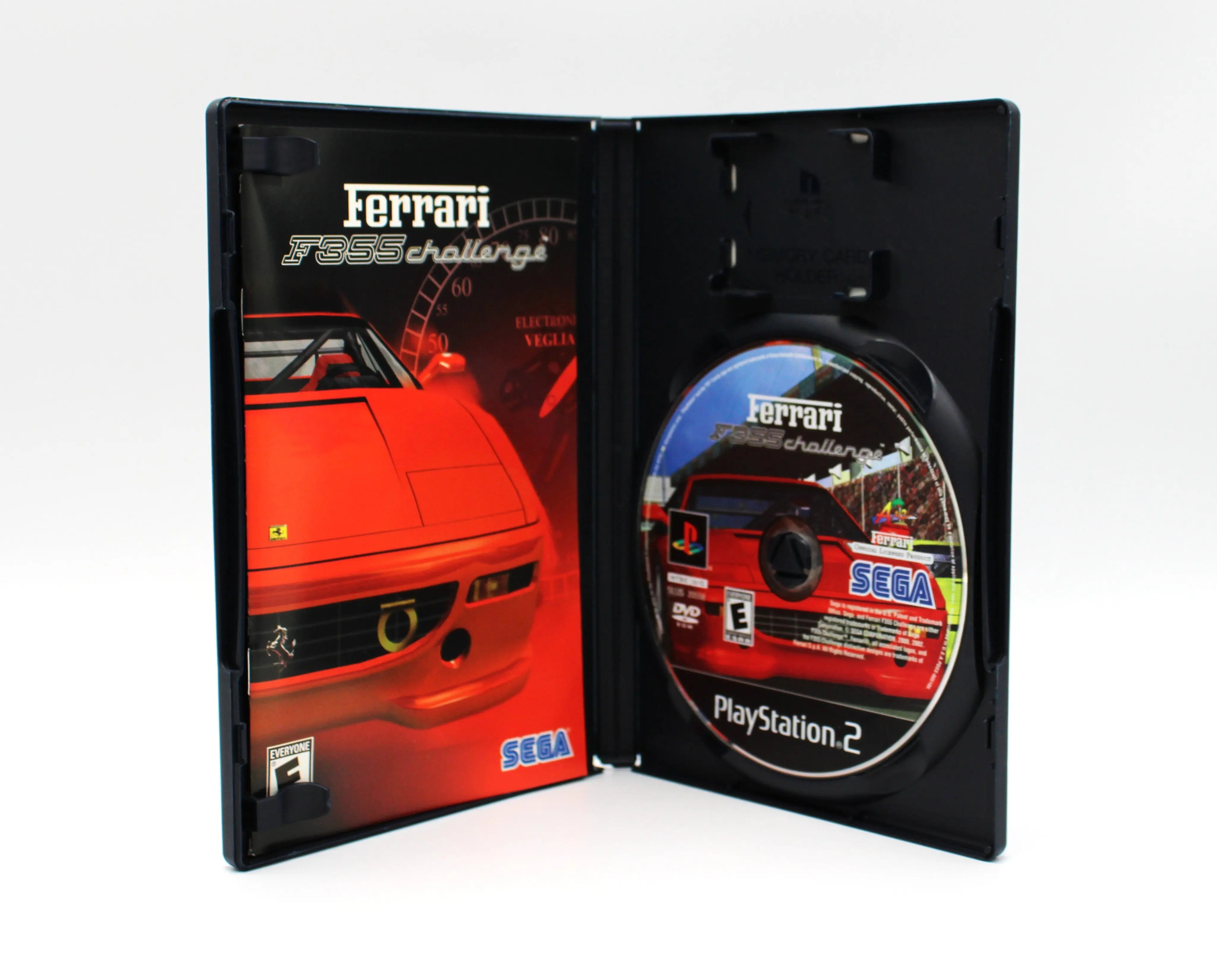 Opened case view of Ferrari F355 Challenge for Sony PlayStation 2 PS2 – CIB with Manual (2002) NTSC-U. Displays game disc and manual positioned inside original PlayStation 2 case.