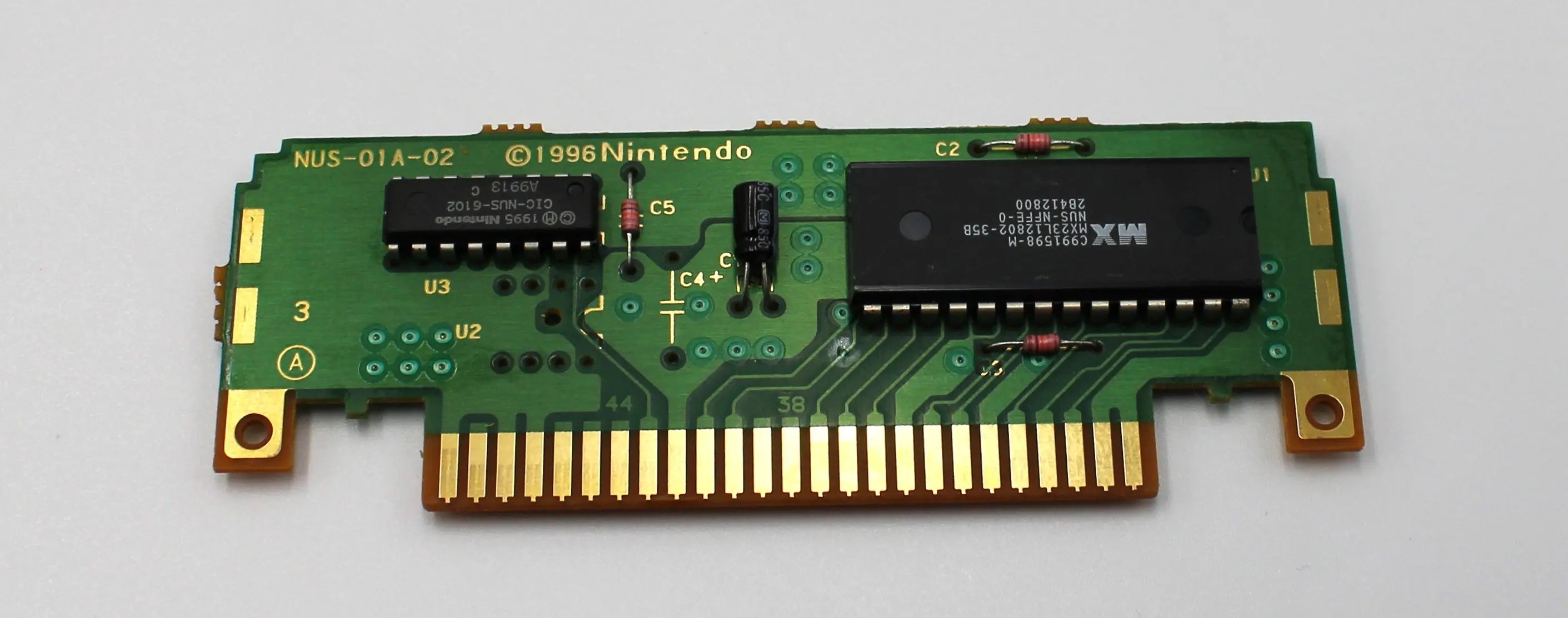 Game board view of NTSC-U copy of Fighting Force 64 for Nintendo 64, N64. (1999) See picture of authentic video game board.