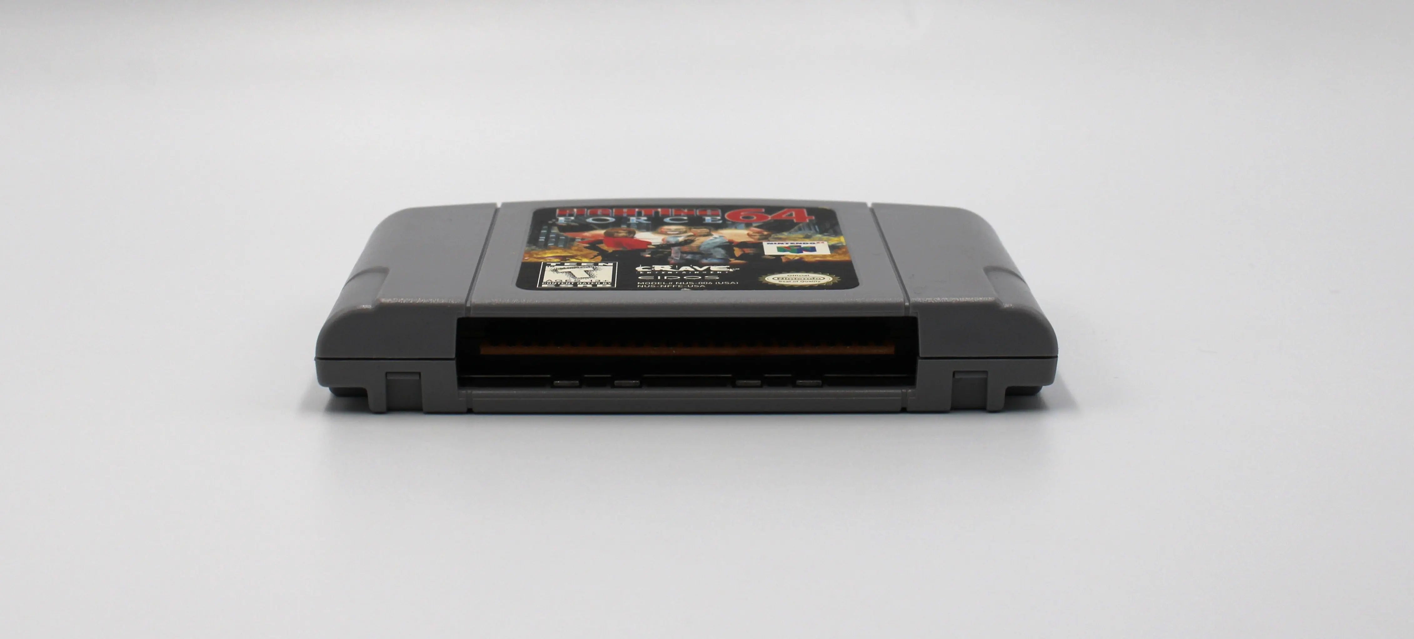 Bottom of Cartridge view of NTSC-U copy of Fighting Force 64 for Nintendo 64, N64. (1999) See picture of polished game pins.