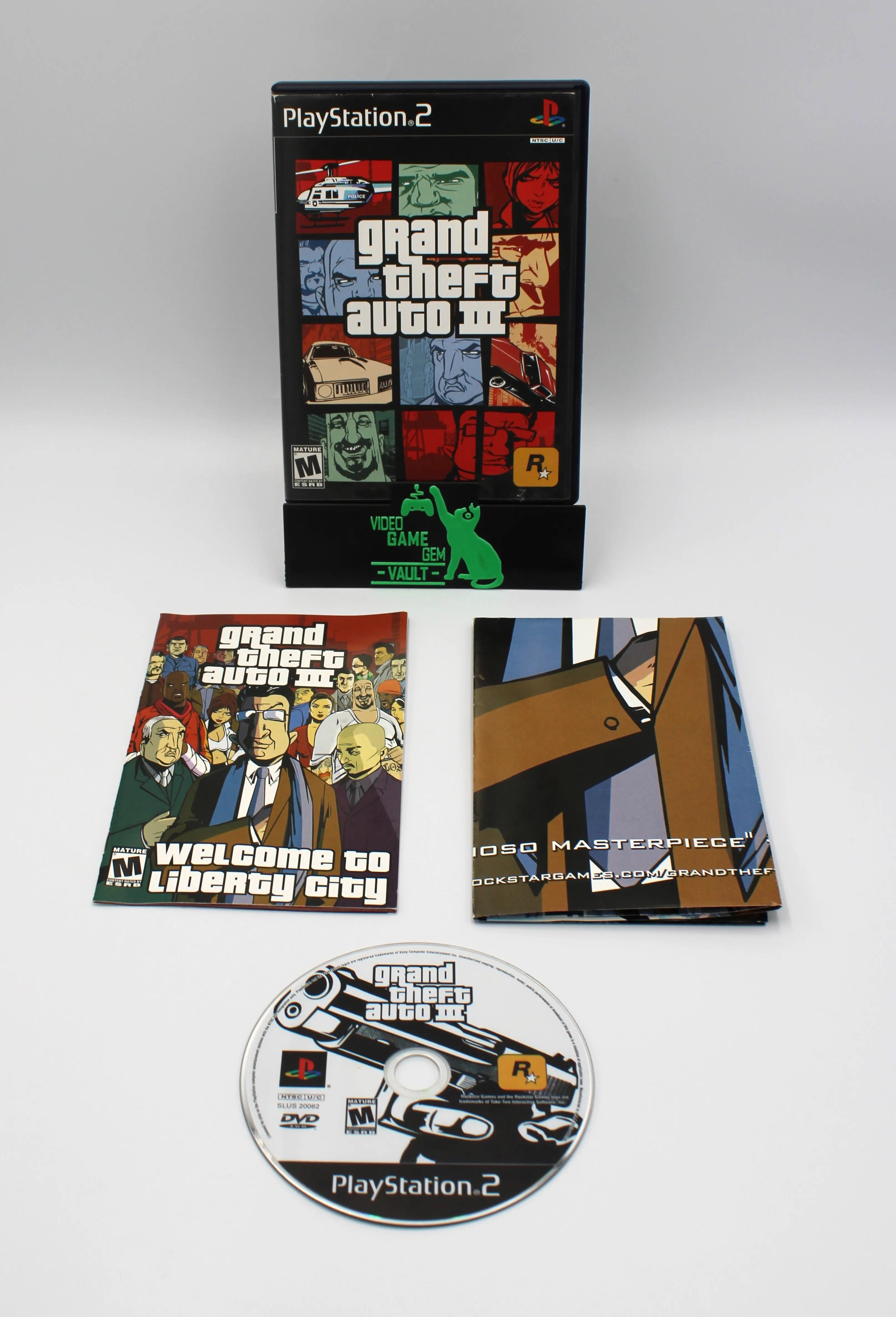 Main display image of black label Grand Theft Auto III for Sony PlayStation 2 PS2 (2001), showing case, manual, game disc, and map, NTSC-U edition.