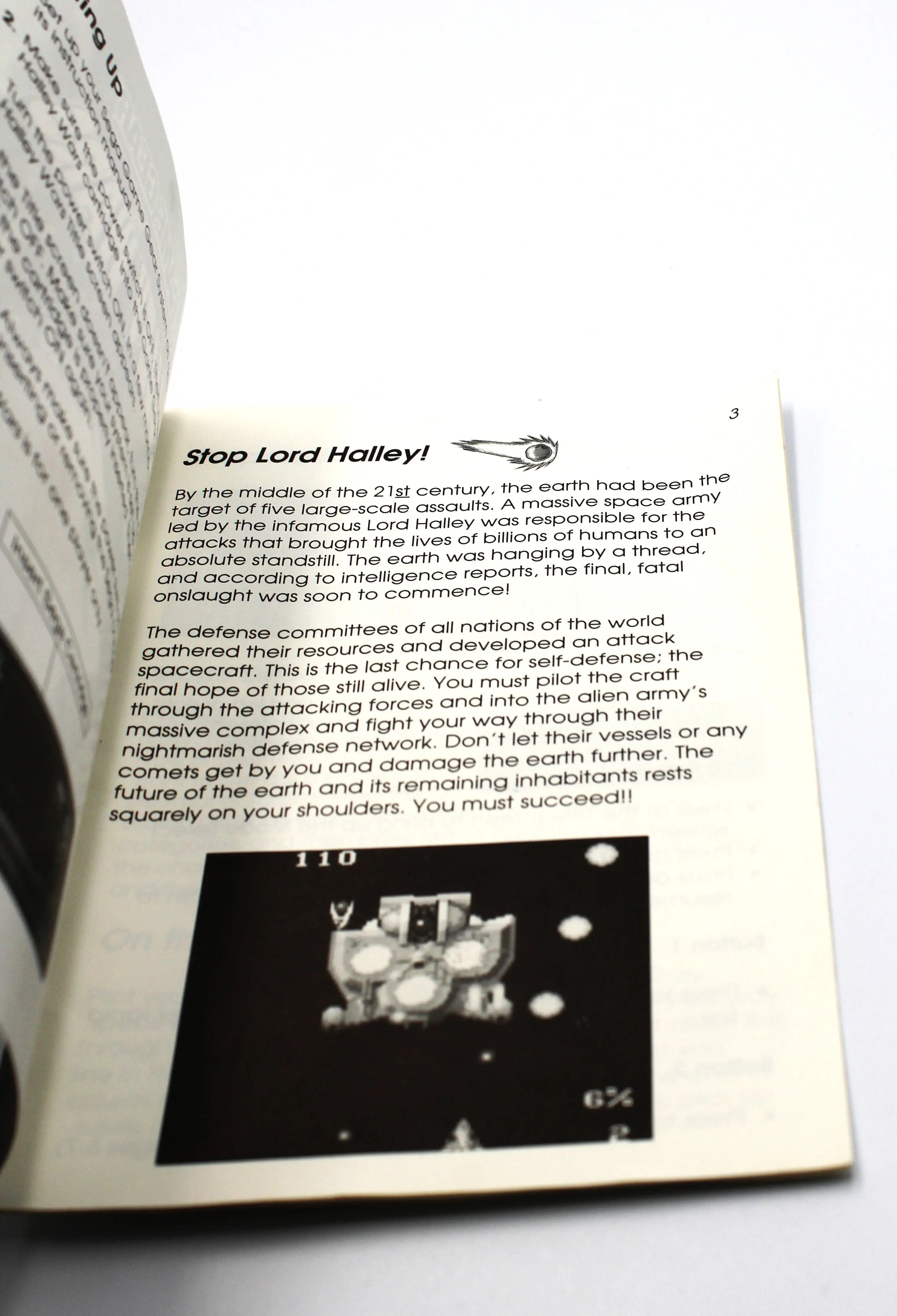 Manual opened flat, revealing interior layout pages, instructions, and diagrams. Page 3. Black and white manual.