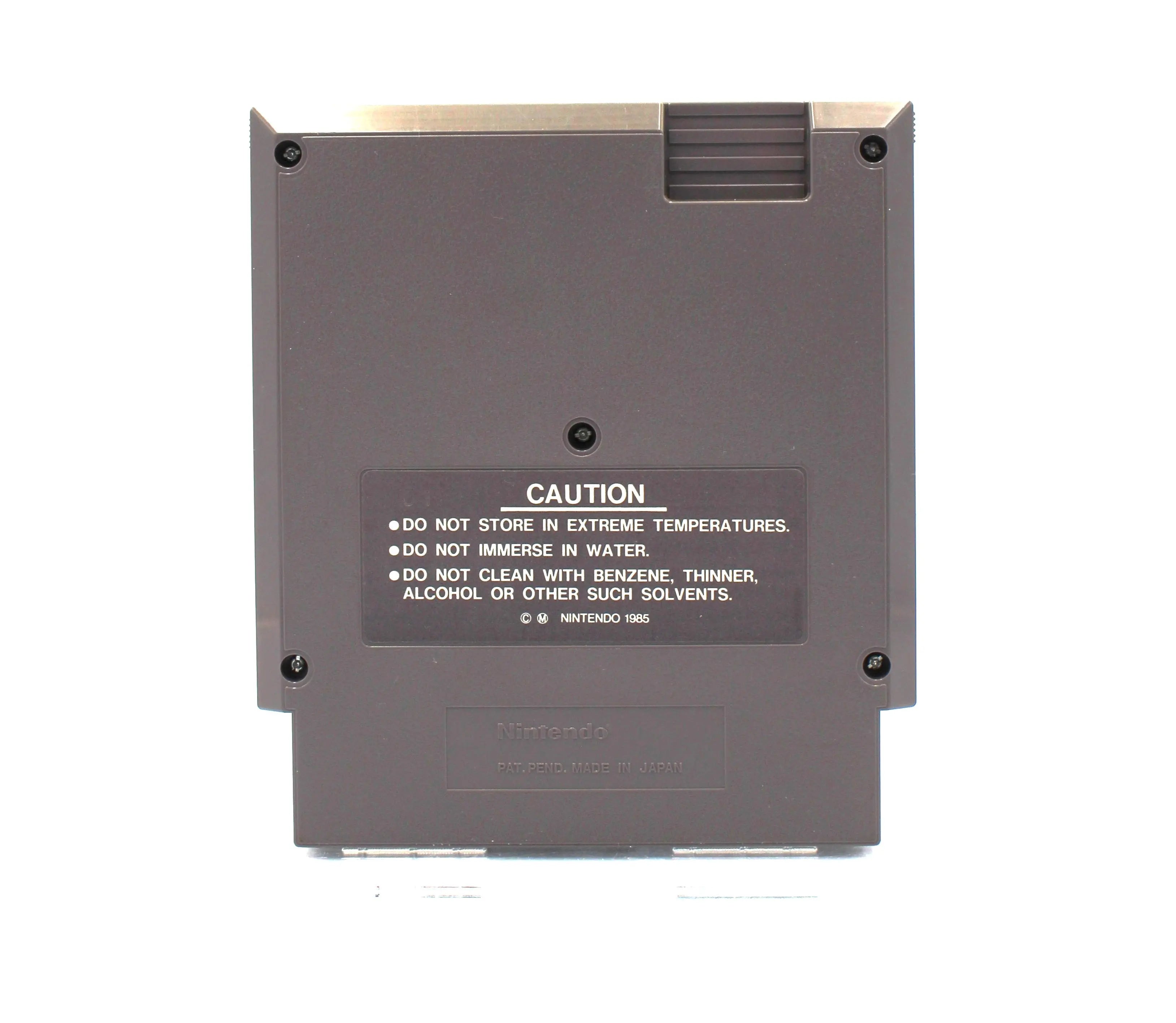 Back view of Ikari Warriors for Nintendo NES – Authentic Game Cartridge (1987), displaying the embossed serial numbers, and all five screw heads securing the shell.