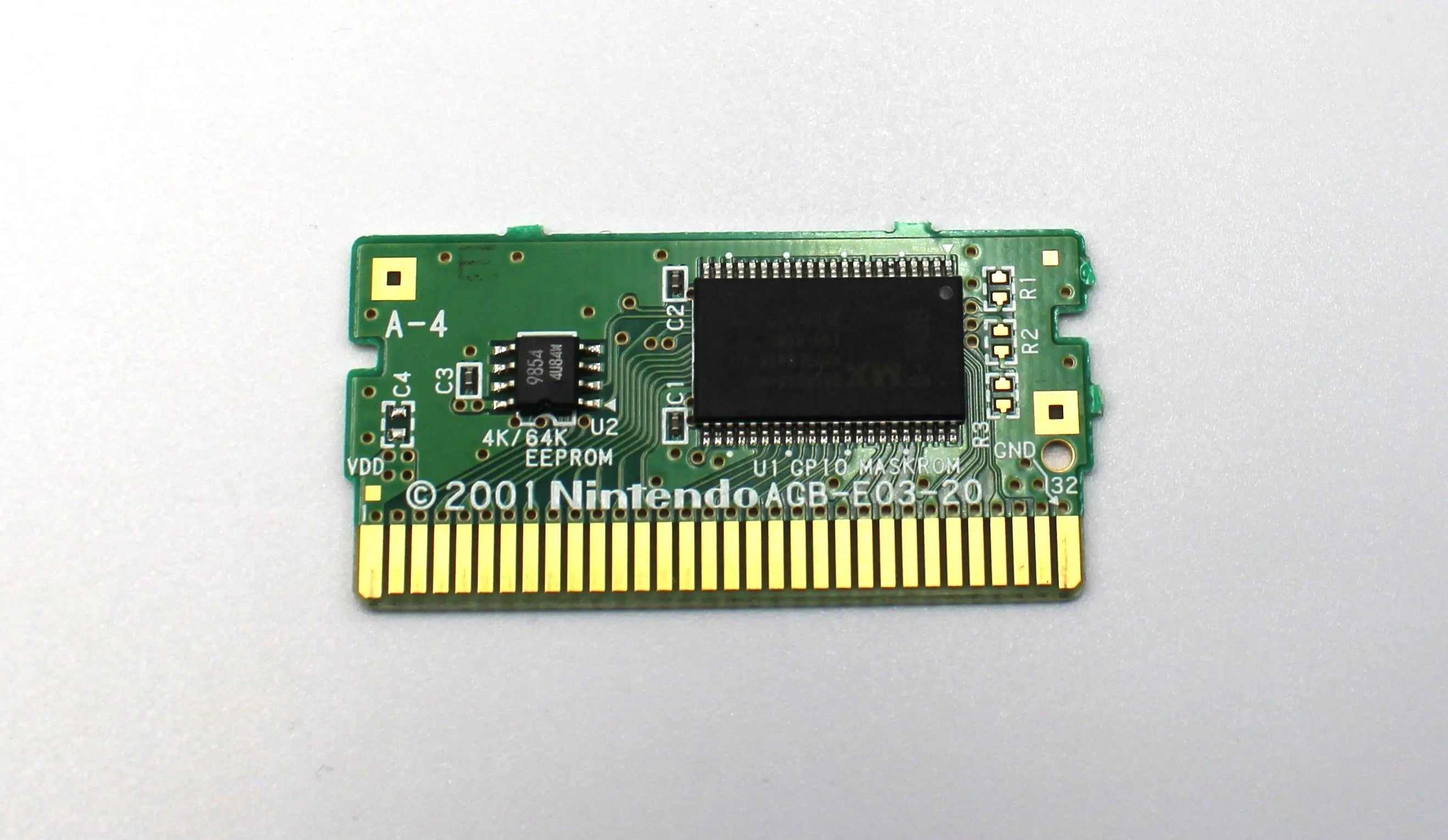 Board view of authentic copy of NTSC-U Mario Party Advance for the Nintendo Game Boy Advance, GBA. See picture of the authentic Mario Party Advance game board.