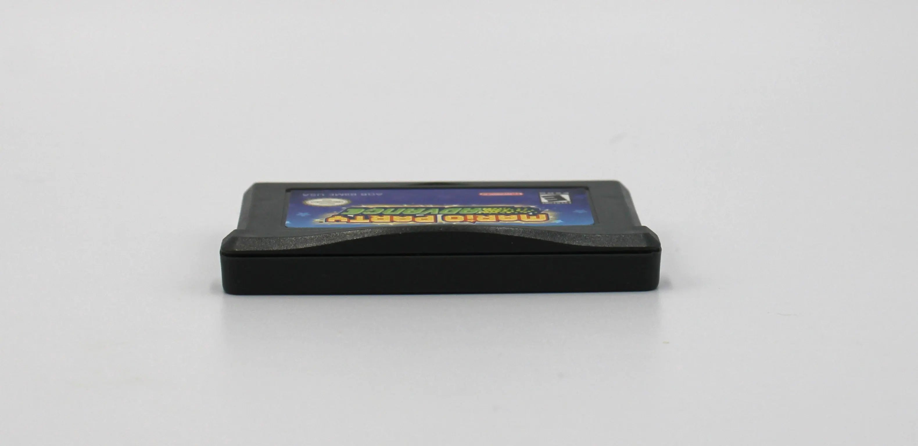 Top view of authentic copy of NTSC-U Mario Party Advance for the Nintendo Game Boy Advance, GBA. See picture of the top of the game cartridge.