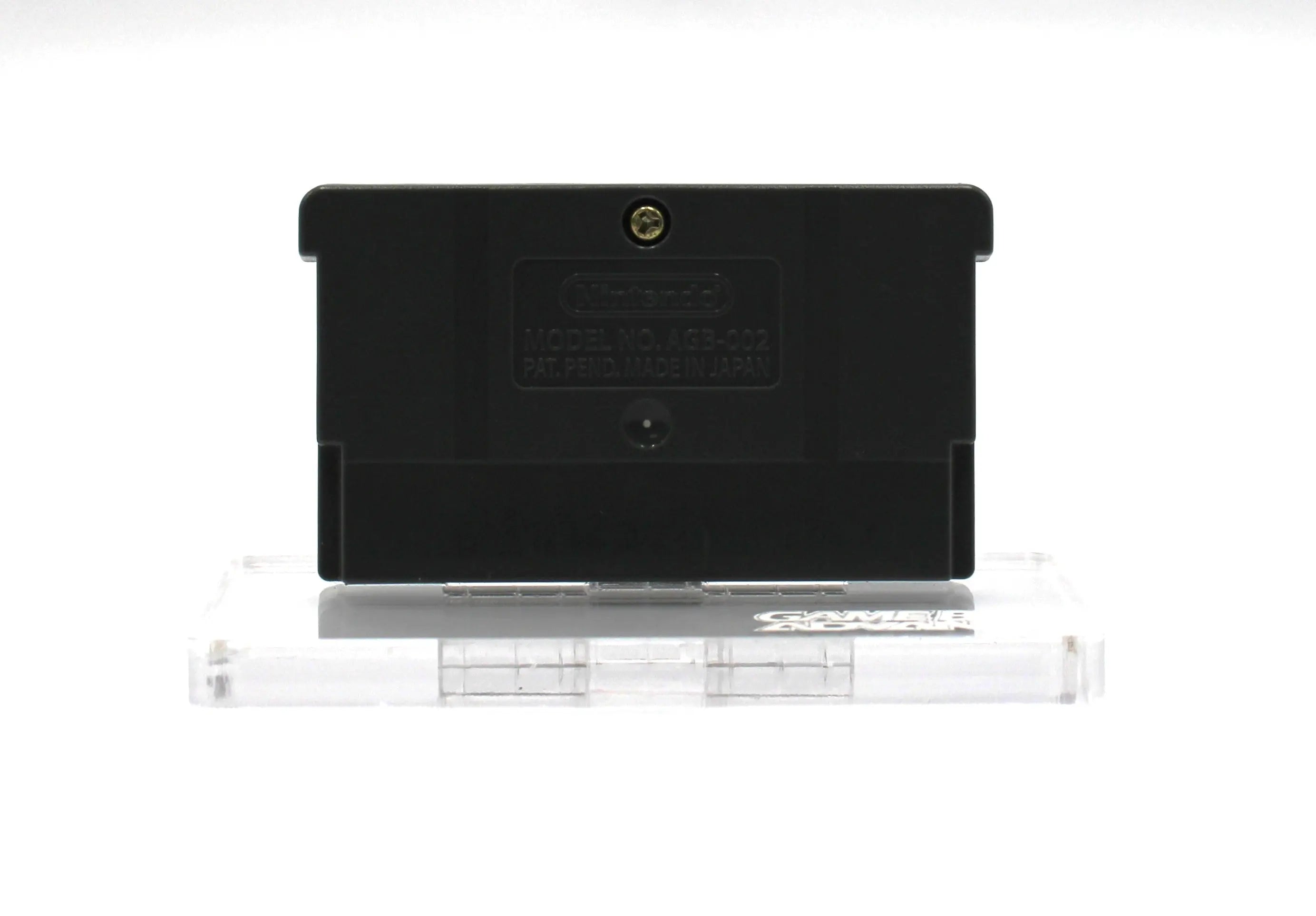 Back shell view of Mario vs. Donkey Kong for Nintendo Game Boy Advance GBA – Authentic Game Cartridge (2004) NTSC-U, showing authentic Nintendo stamping and screw position.