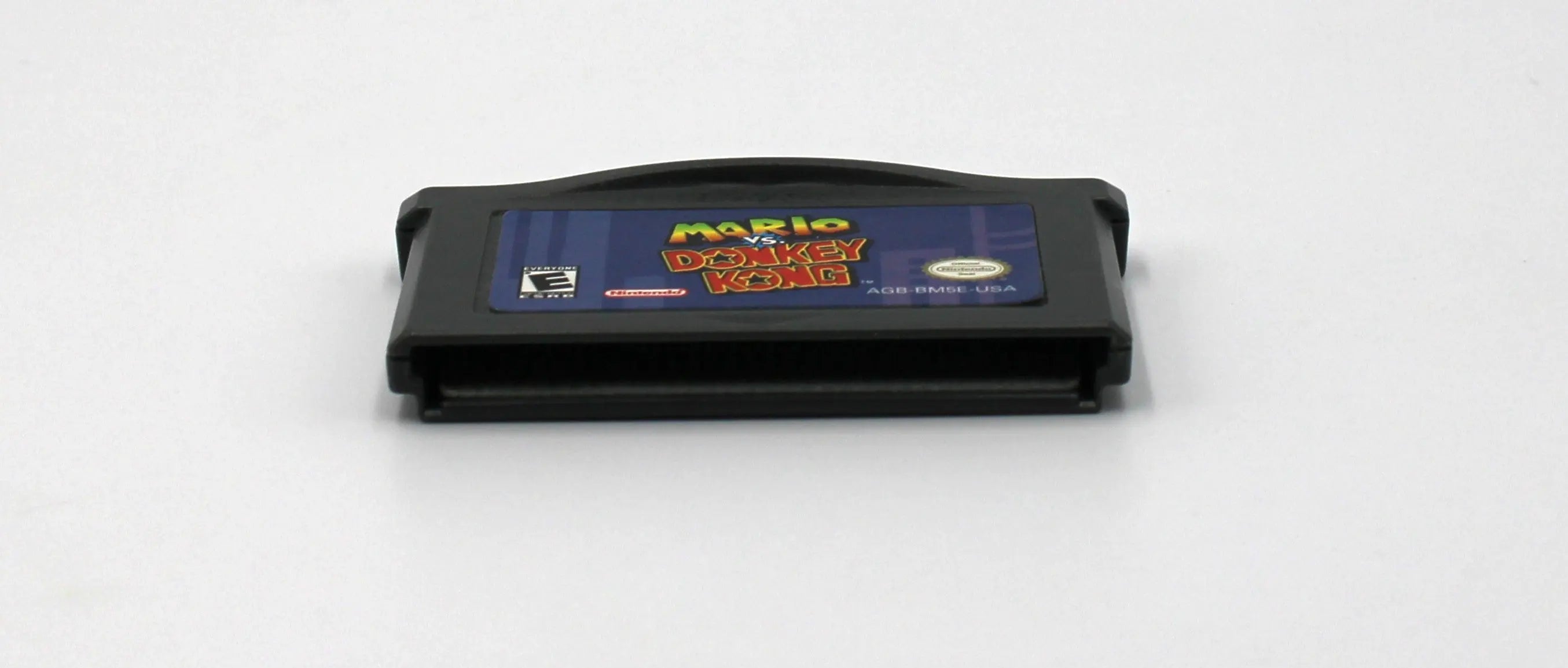 Bottom edge view of Mario vs. Donkey Kong for Nintendo Game Boy Advance GBA – Authentic Game Cartridge (2004) NTSC-U, showing clean, authentic pin connector and internal board fit.