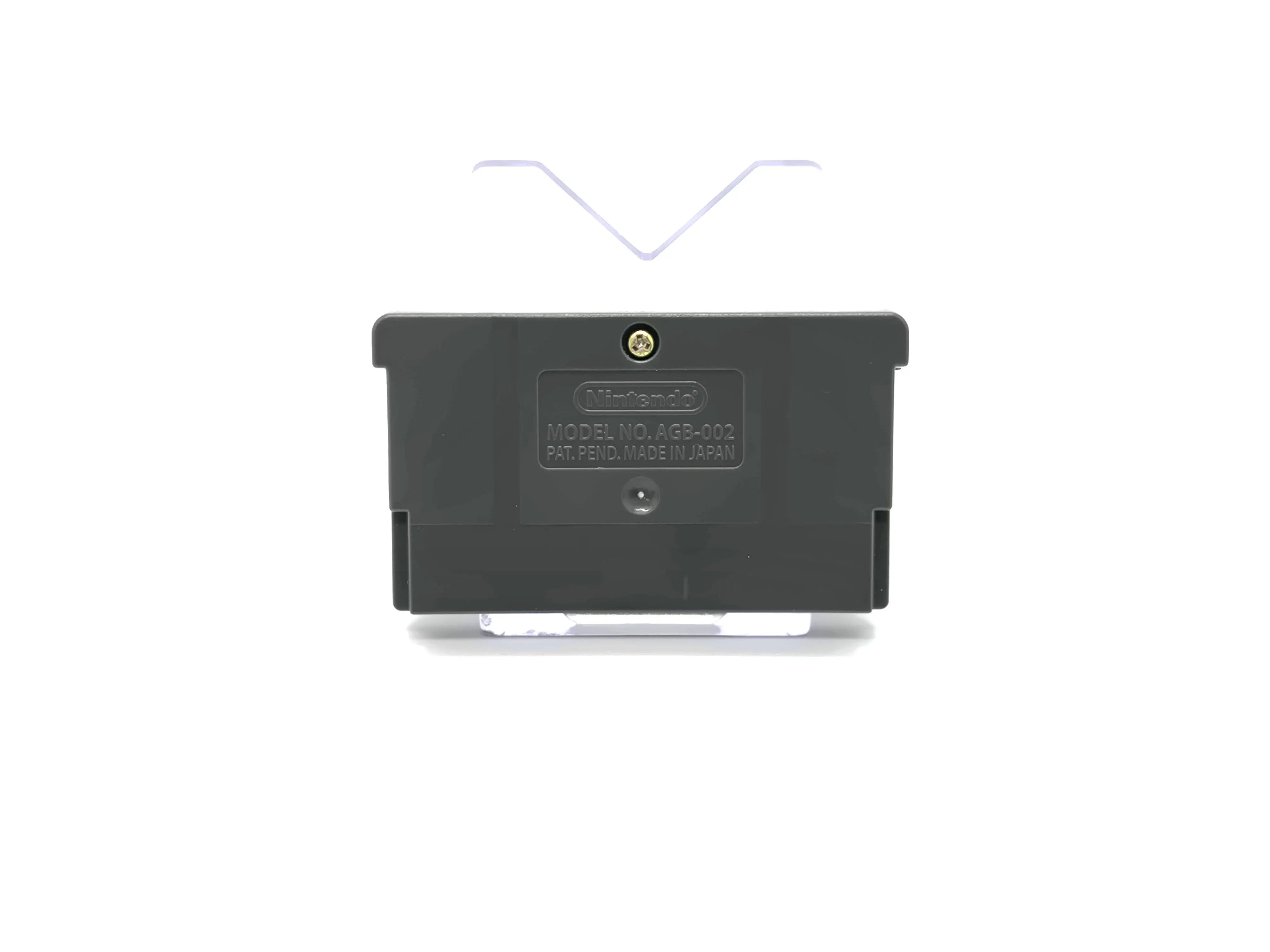 Back shell view of Mario vs. Donkey Kong for Nintendo GameBoy Advance. Authentic Game Cartridge (2004) NTSC-U, showing authentic Nintendo stamping and y-tip screw position. Made in Japan and correct model number.