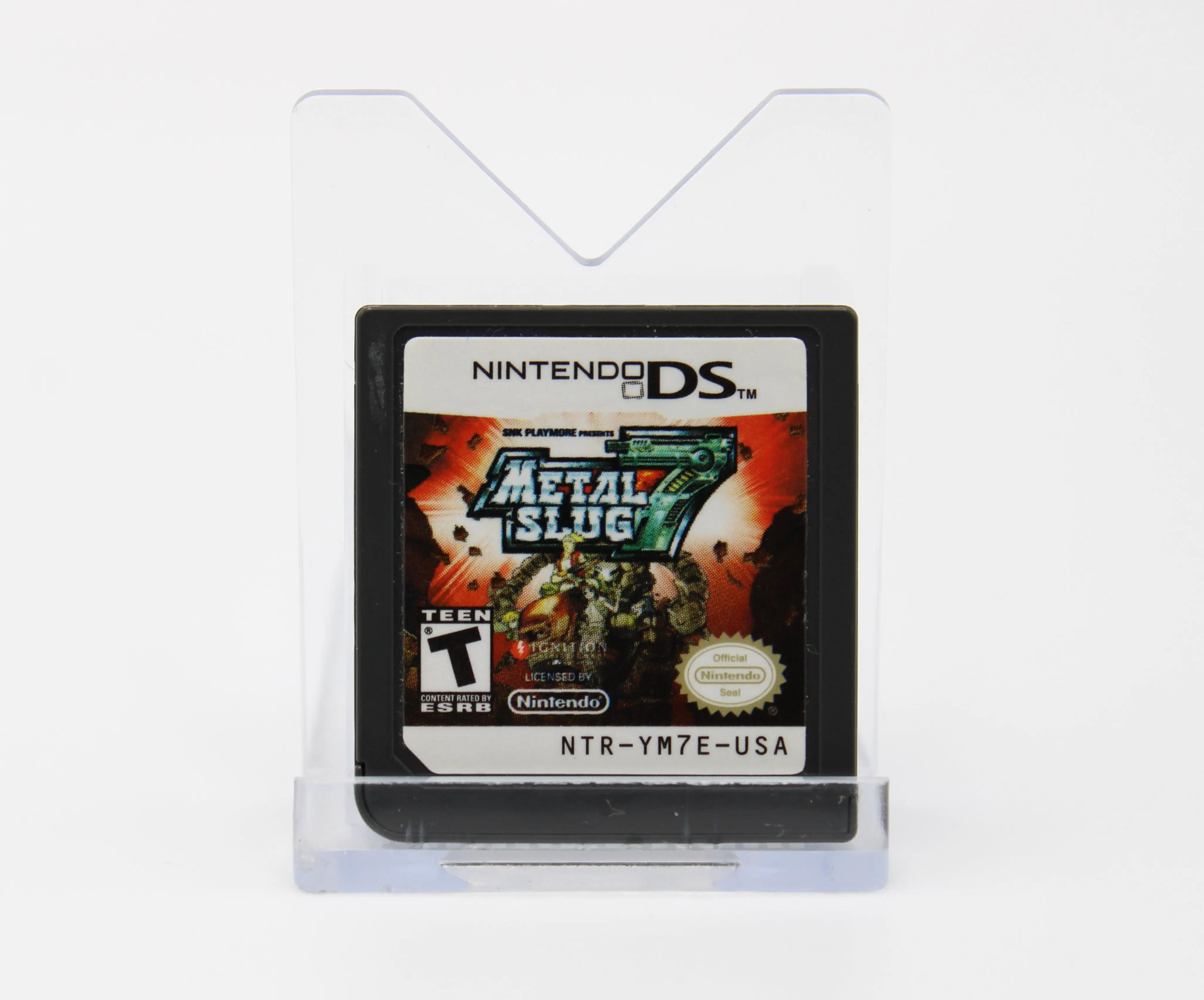 Front label view of Authentic NTSC-U copy of metal slug 7 for the Nintendo DS. Game cartridge only. See picture of front label of the cartridge. Small silver stain to the left.
