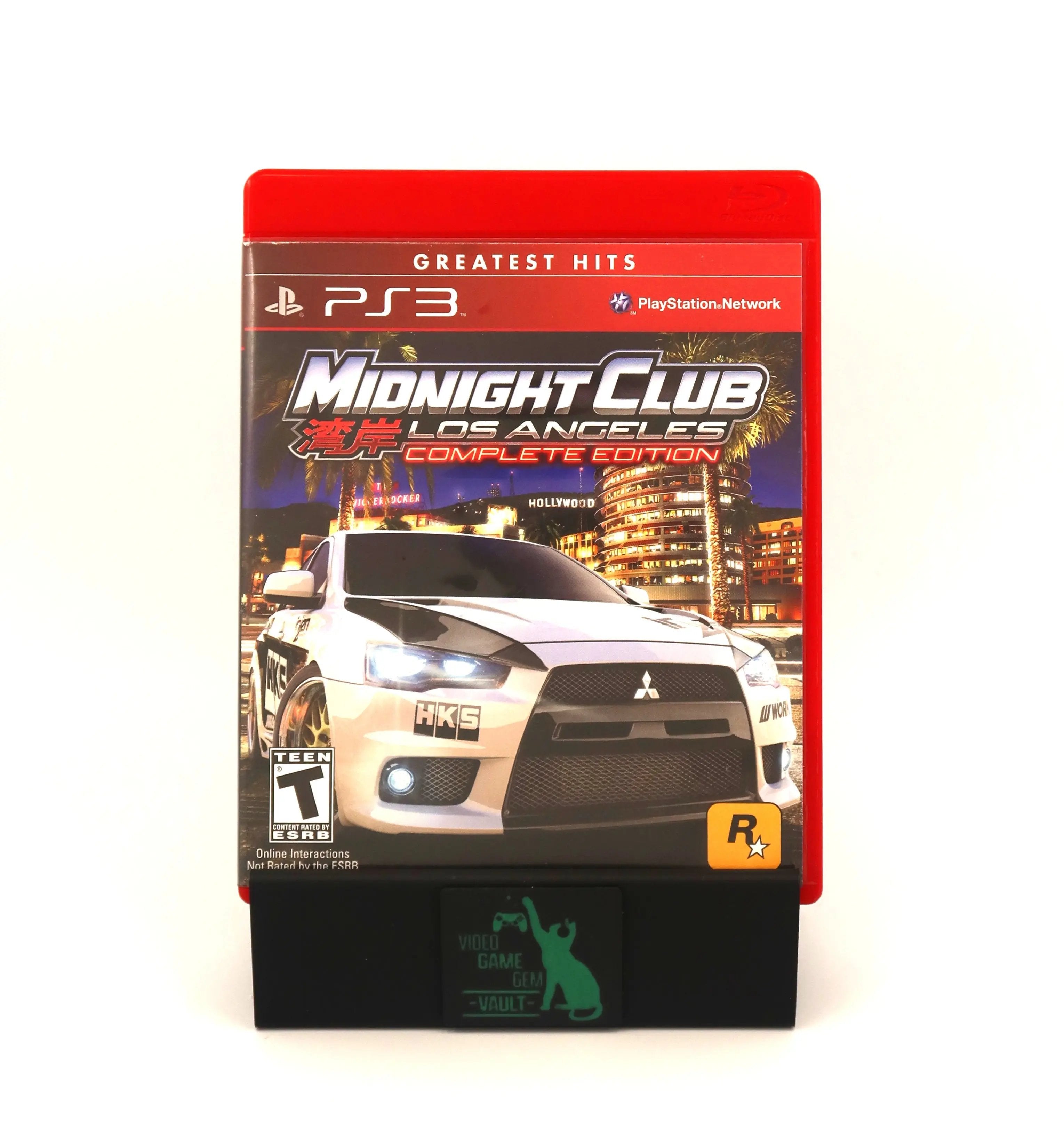 View of front artwork on case of a complete in box copy of Midnight Club Los Angeles Complete Edition for the Sony PlayStation 3. NTSC-U. Released 2009. Clear visuals of title text, PS3 logo, Rockstar Logo and ESRB T in an OEM red Sony PS3 case on a clean white background.