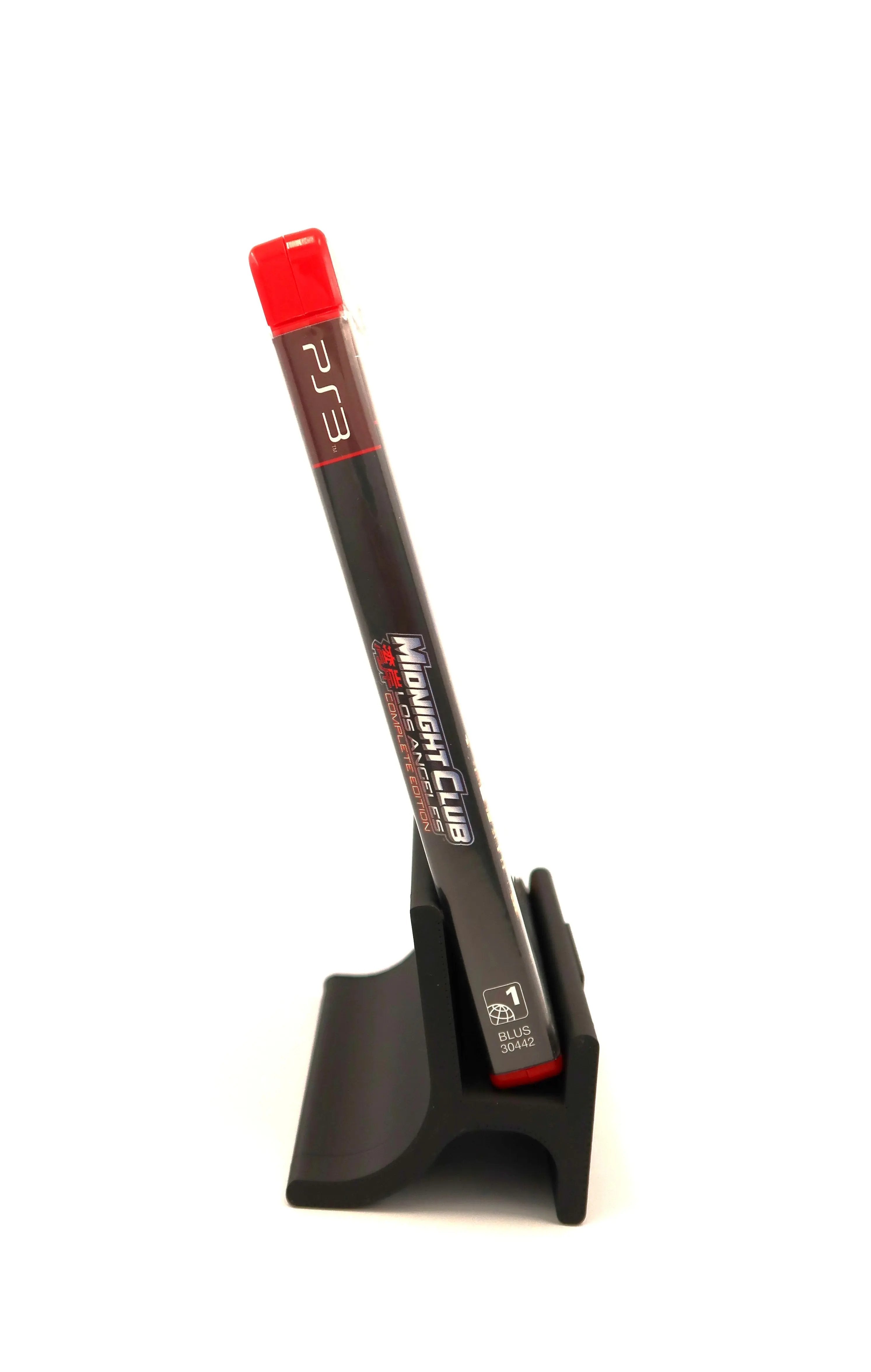 View of case spine of a complete in box copy of Midnight Club Los Angeles Complete Edition for the Sony PlayStation 3. NTSC-U. Released 2009. Clear visuals of PS3 text, game title text BLUS, and region in an OEM Sony PS3 red case on a clean white background.