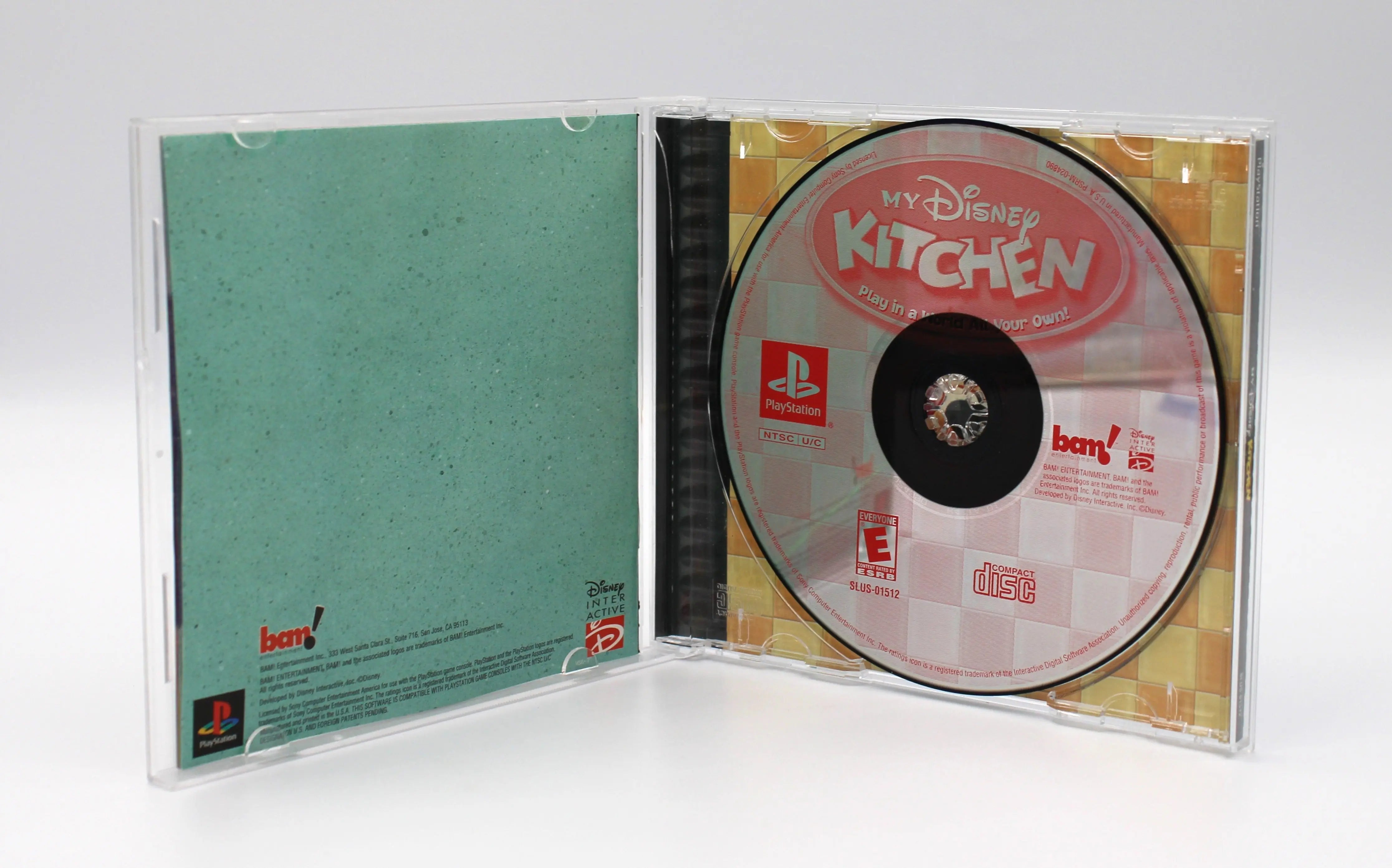 Open case image of My Disney Kitchen for Sony PlayStation 1 PS1 (2002), showing manual and game disc, Black Label NTSC-U version.