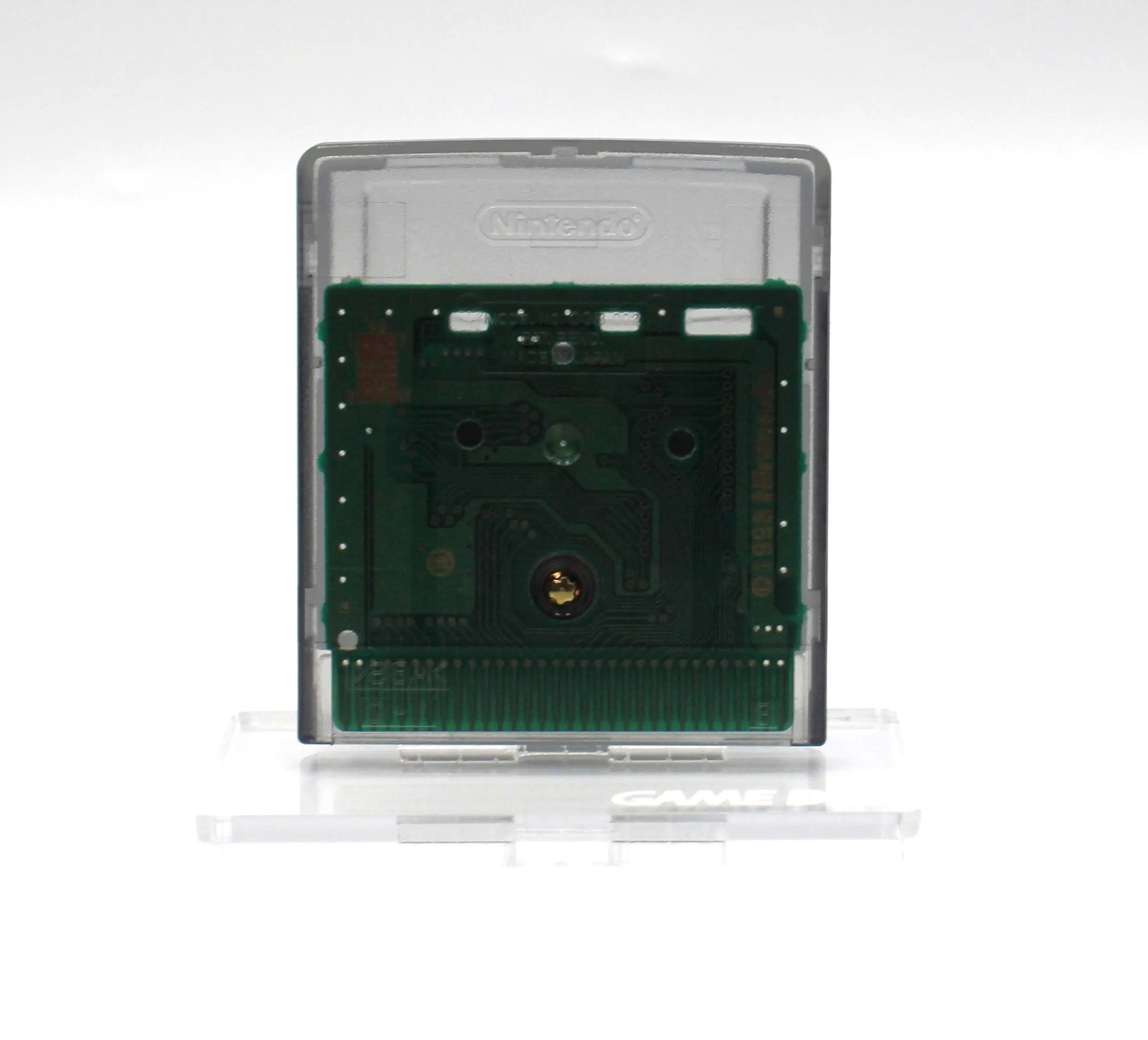 Back shell view of Rampart for Nintendo Game Boy Color GBC – Authentic Game Cartridge (1999) NTSC‑U, showing authentic Nintendo stamping and security screw position.