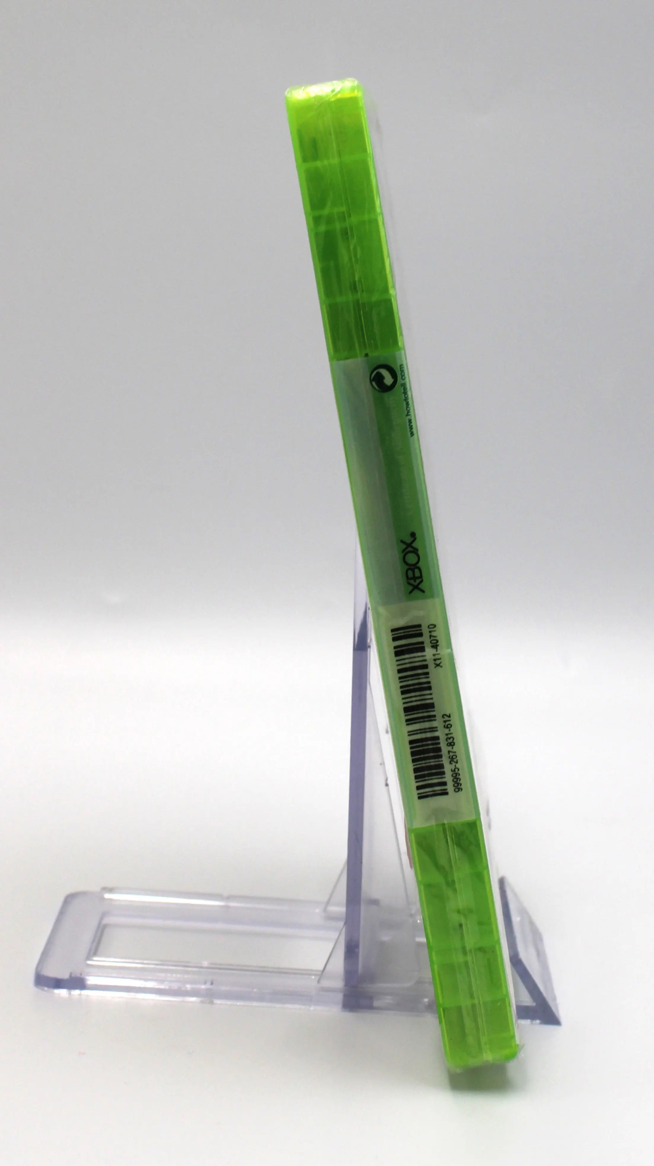 Side view of Red Dead Redemption for Microsoft Xbox 360 NTSC-U sealed Platinum Hits game case, showing white Xbox 350 sticker for authenticity verification, and sealed packaging.