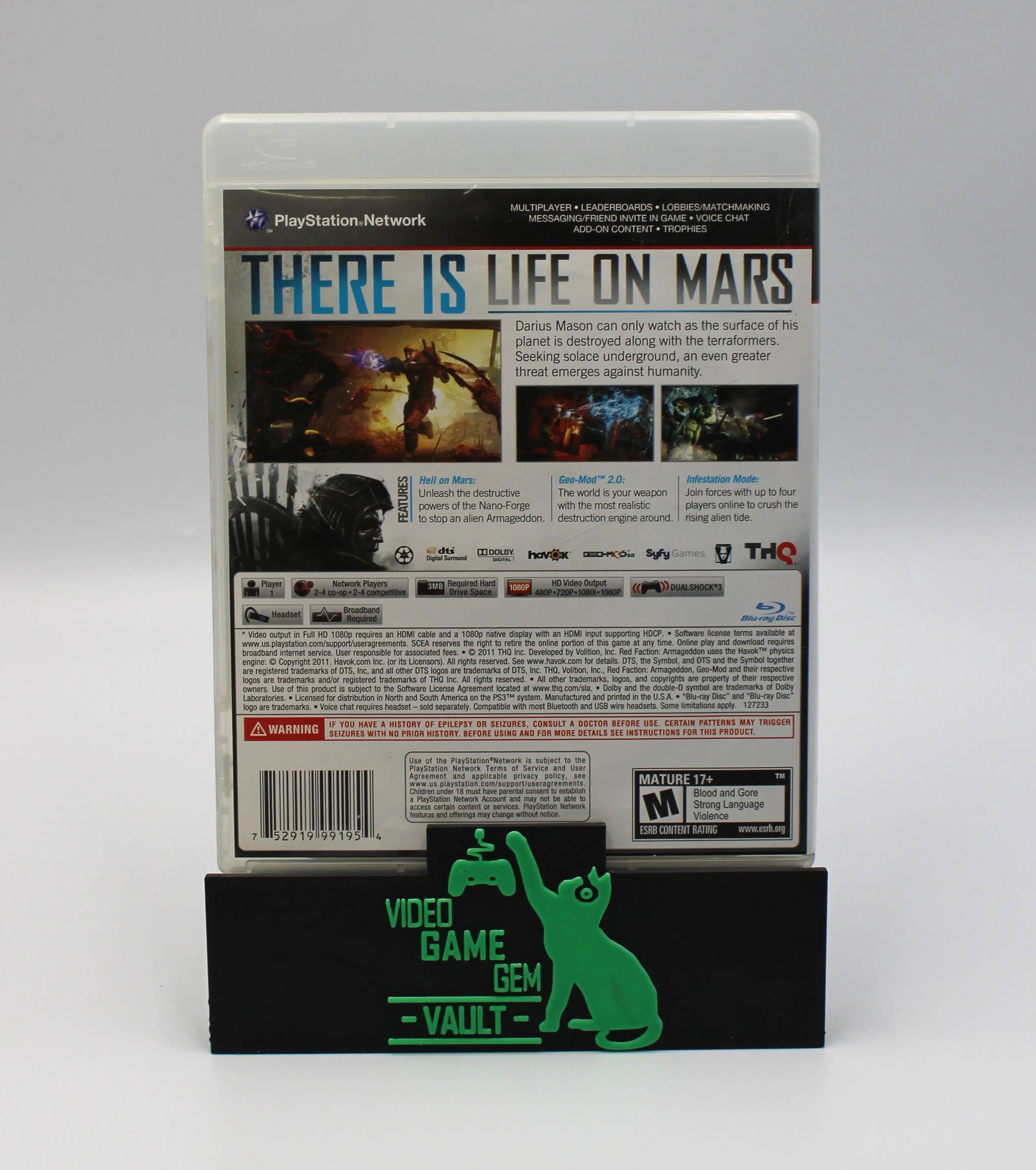 Back cover of the Red Faction: Armageddon PS3 case, clearly displaying ESRB rating, game synopsis, system requirements, and barcode.
