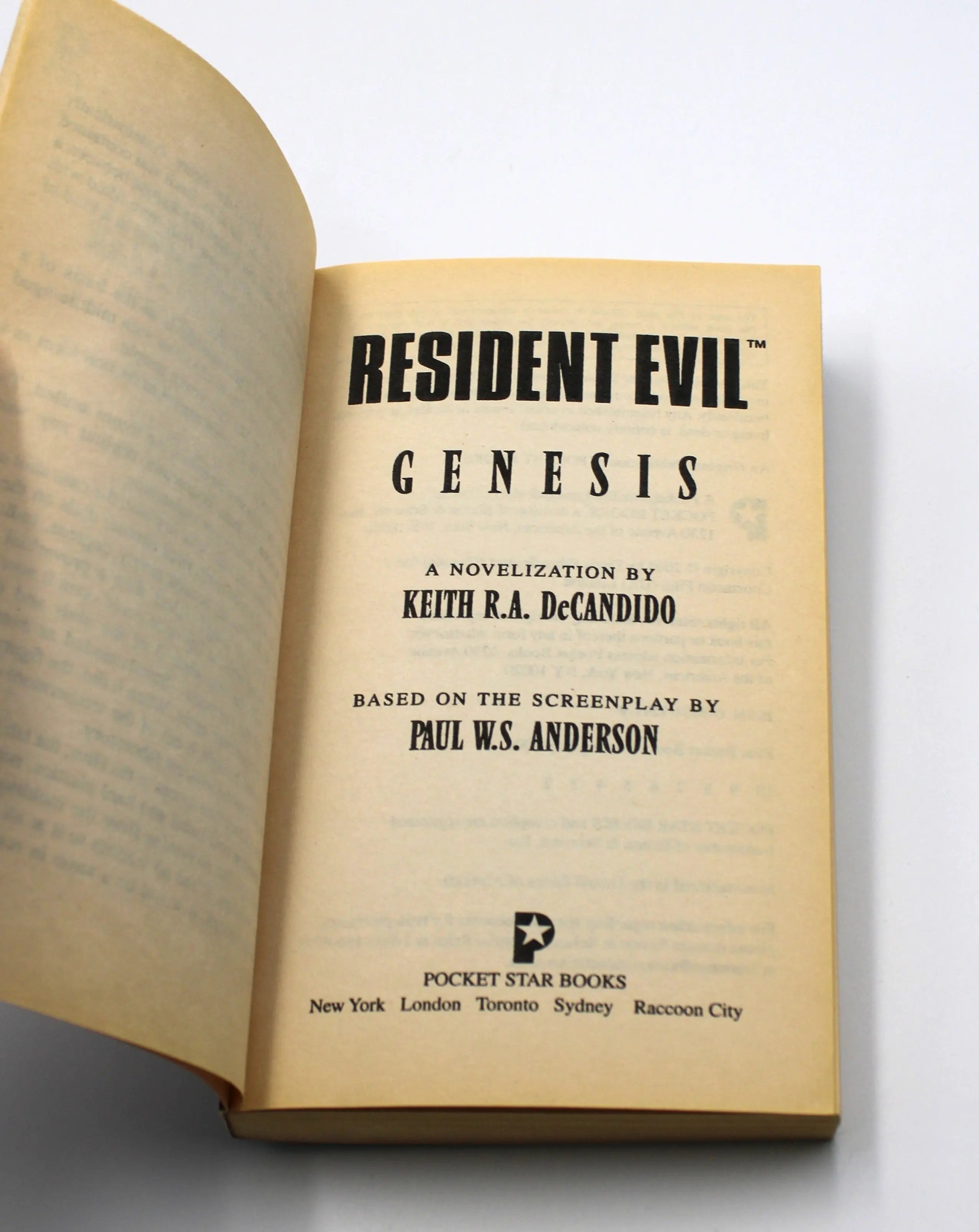 Title page of Resident Evil: Genesis – A Novelization by Keith R.A. DeCandido based on the screenplay by Paul W.S. Anderson. First print Pocket Star Books edition.