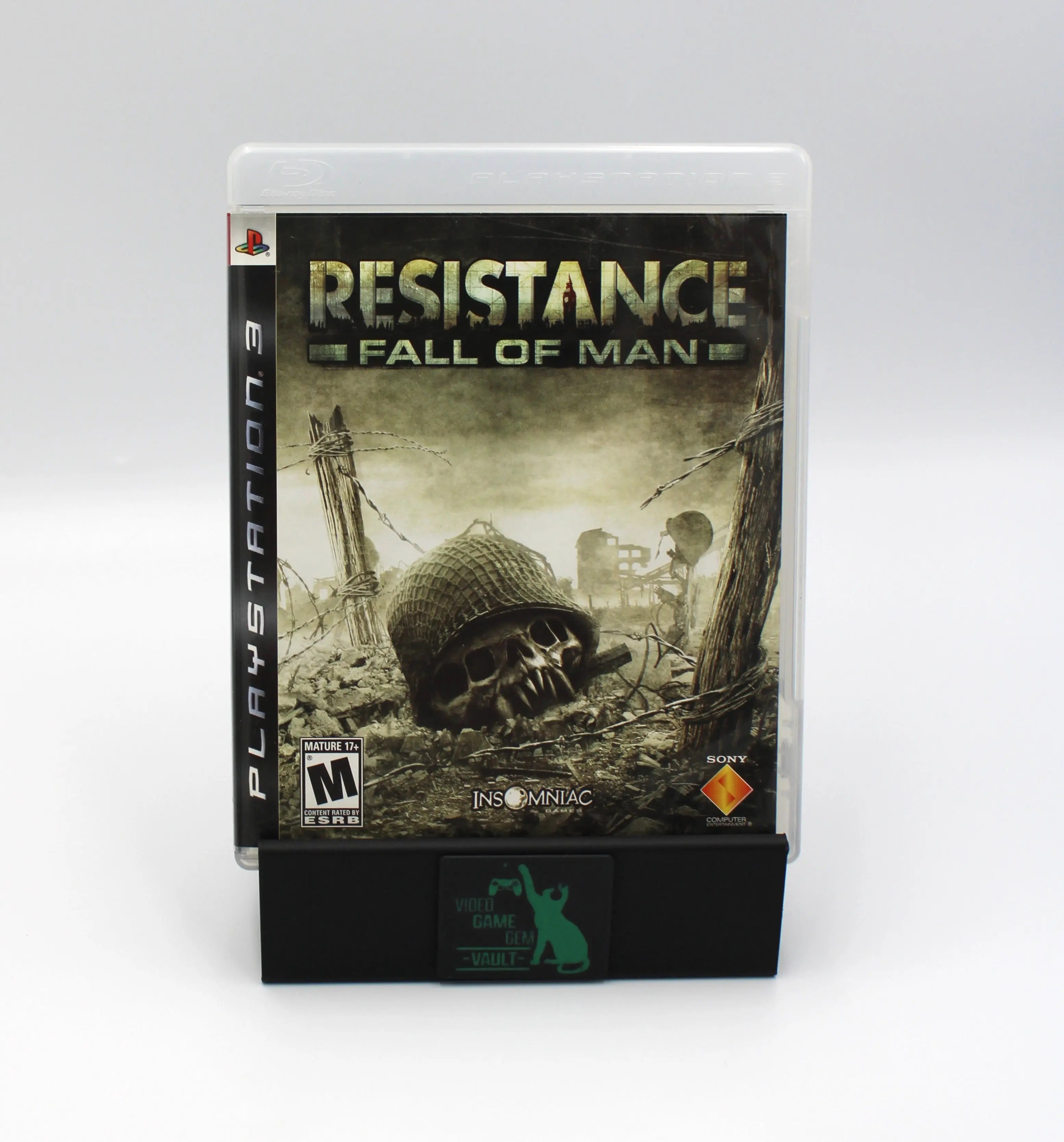 Front cover of Resistance: Fall of Man for PS3 NTSC-U, featuring war-torn battlefield imagery and the signature skull in a helmet artwork.