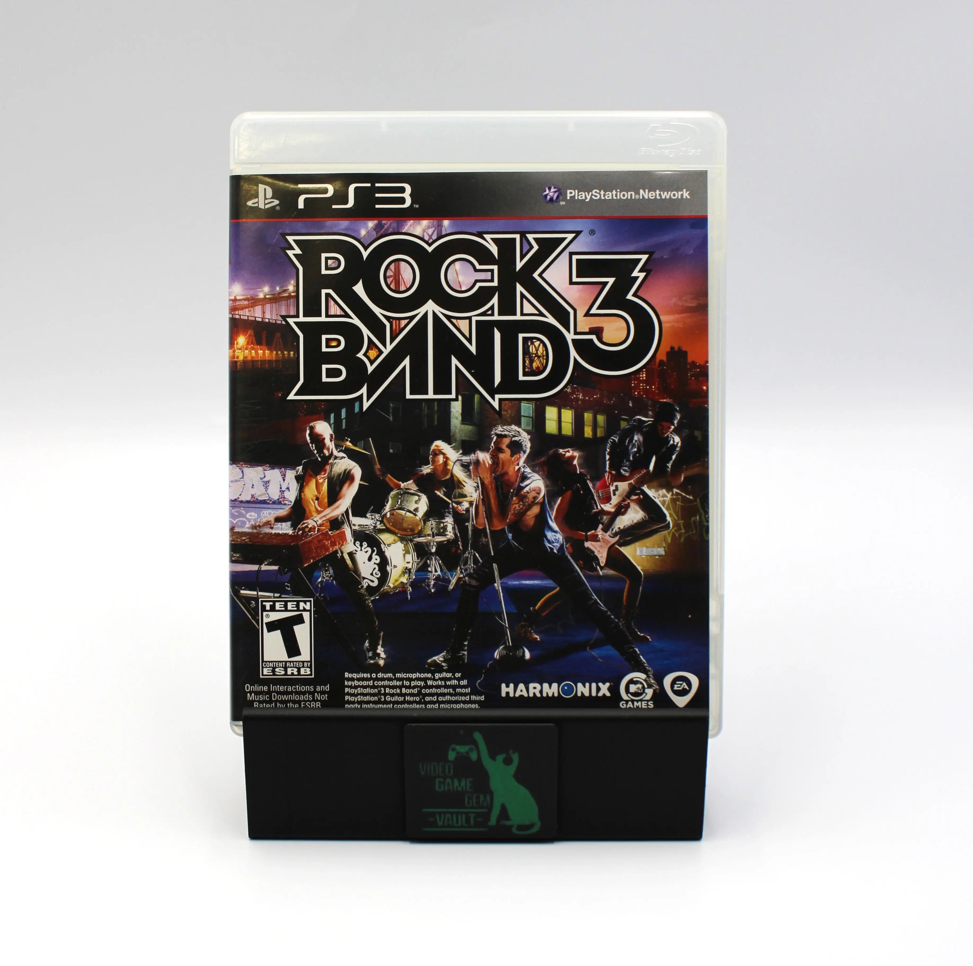 Front cover view of Rock Band 3 for Sony PlayStation 3 PS3 – Complete in Box (2010) NTSC-U. Features cover artwork with band members performing in a city backdrop and the official Harmonix logo.