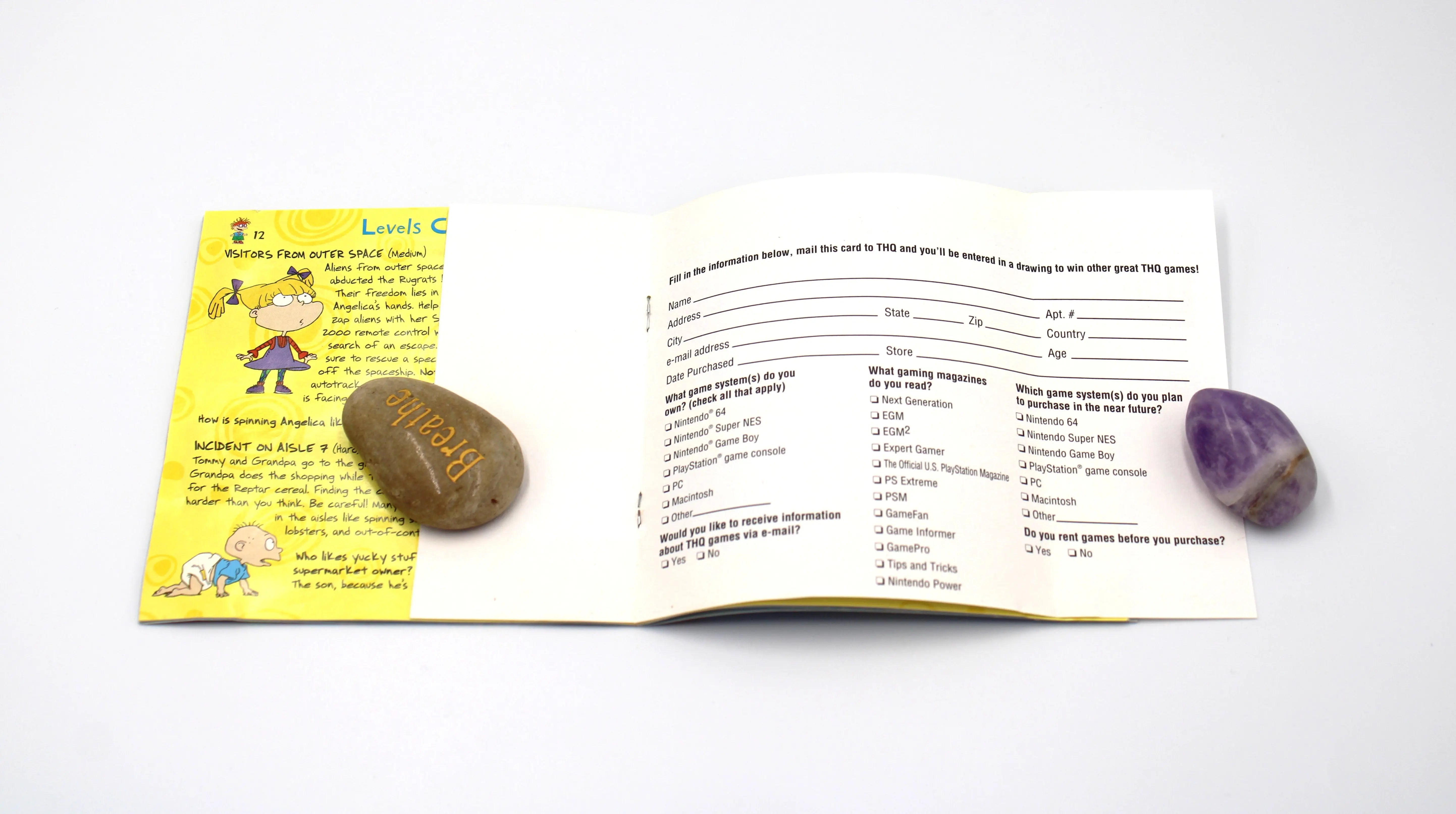 Registration card back: Back of the registration card for Rugrats: Search for Reptar for Sony PlayStation 1 (PS1) – CIB with Registration Card (1998) NTSC-U, black label edition, displaying the warranty and mailing instructions.