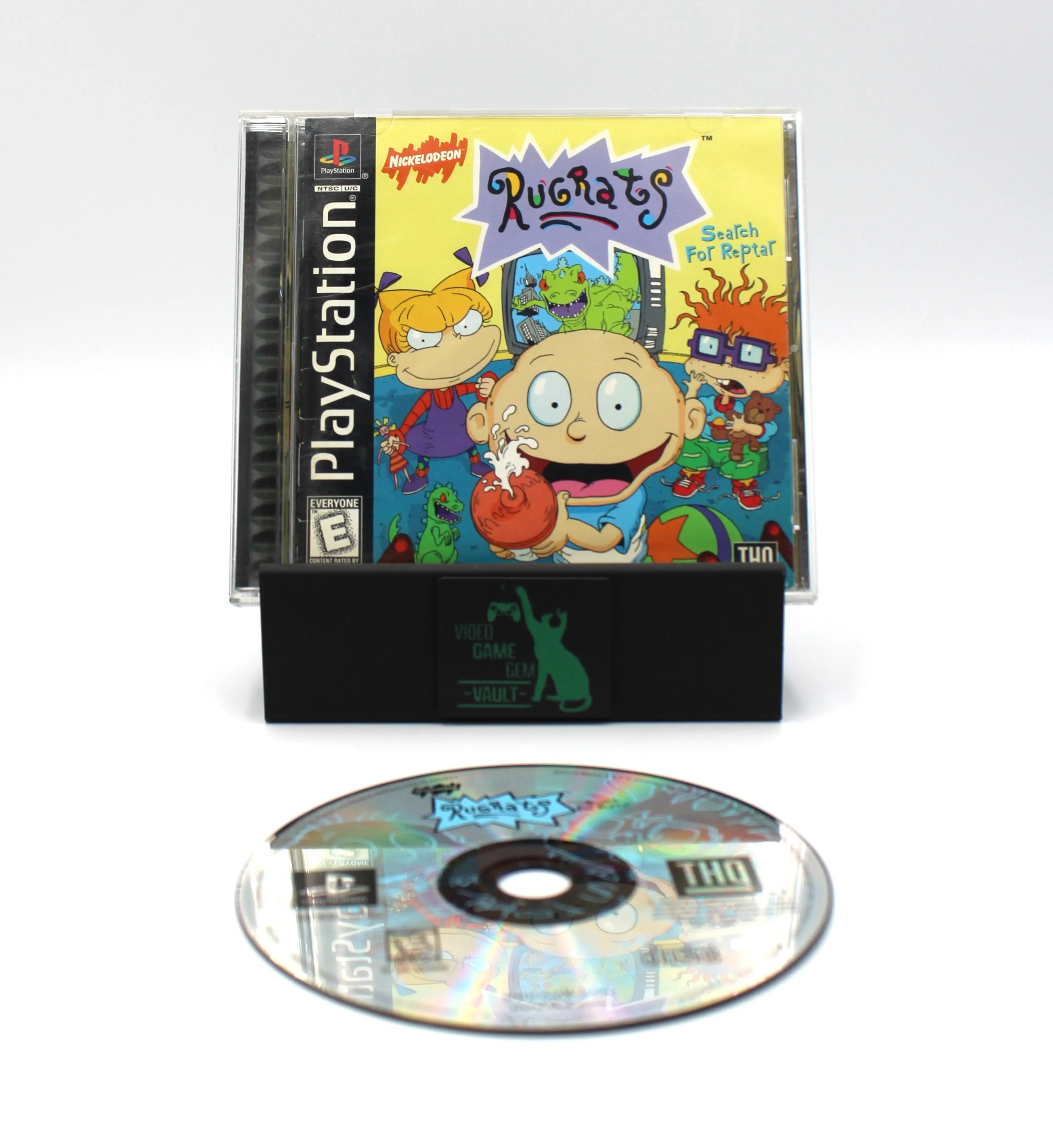 Main display: Main display of Rugrats: Search for Reptar for Sony PlayStation 1 (PS1) – CIB with Registration Card (1998) NTSC-U, black label edition, showing the complete case, manual, disc, and registration card arranged side by side.