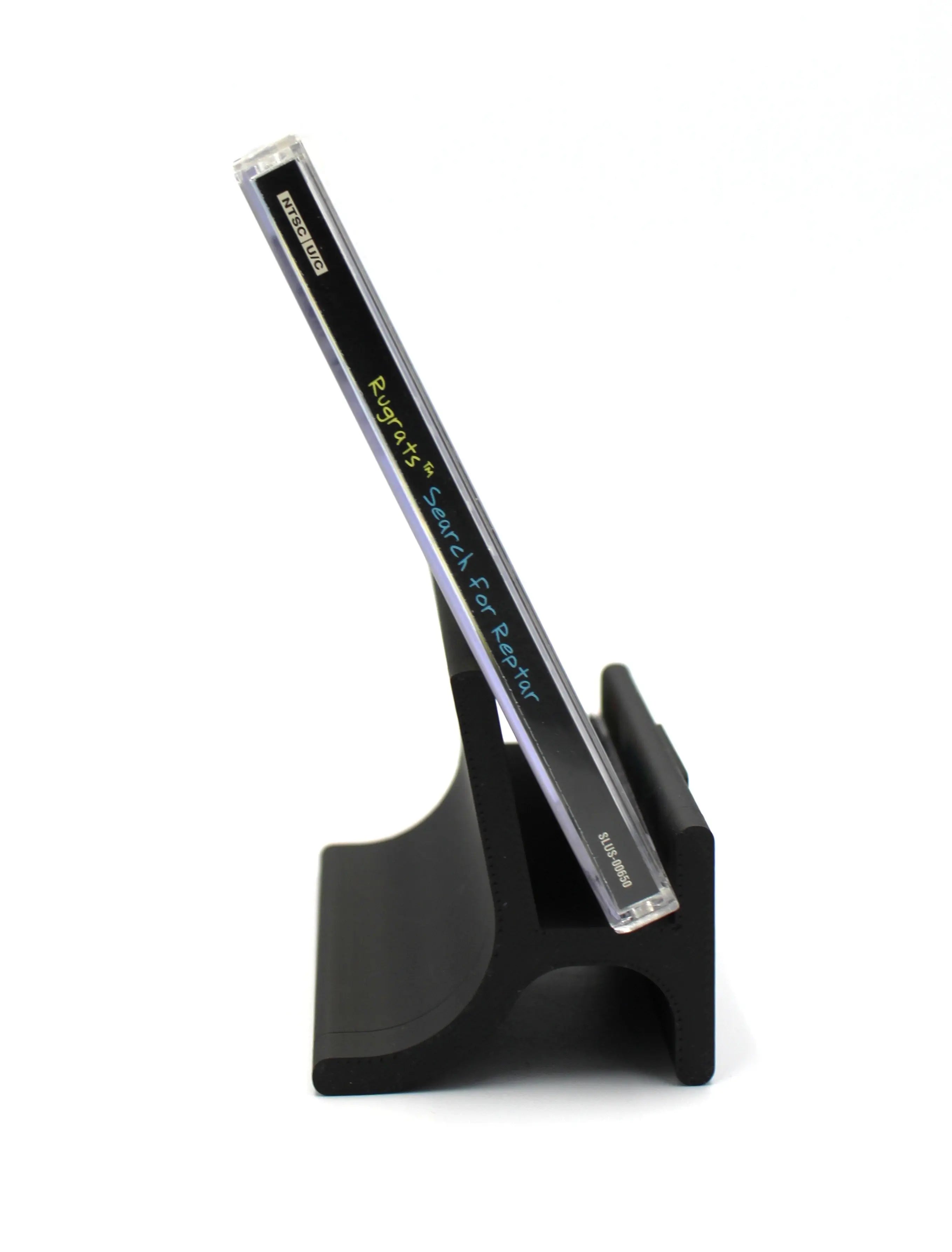 Side of case: Side view of Rugrats: Search for Reptar for Sony PlayStation 1 (PS1) – CIB with Registration Card (1998) NTSC-U, black label edition, showing the case’s right-hand spine and edge.