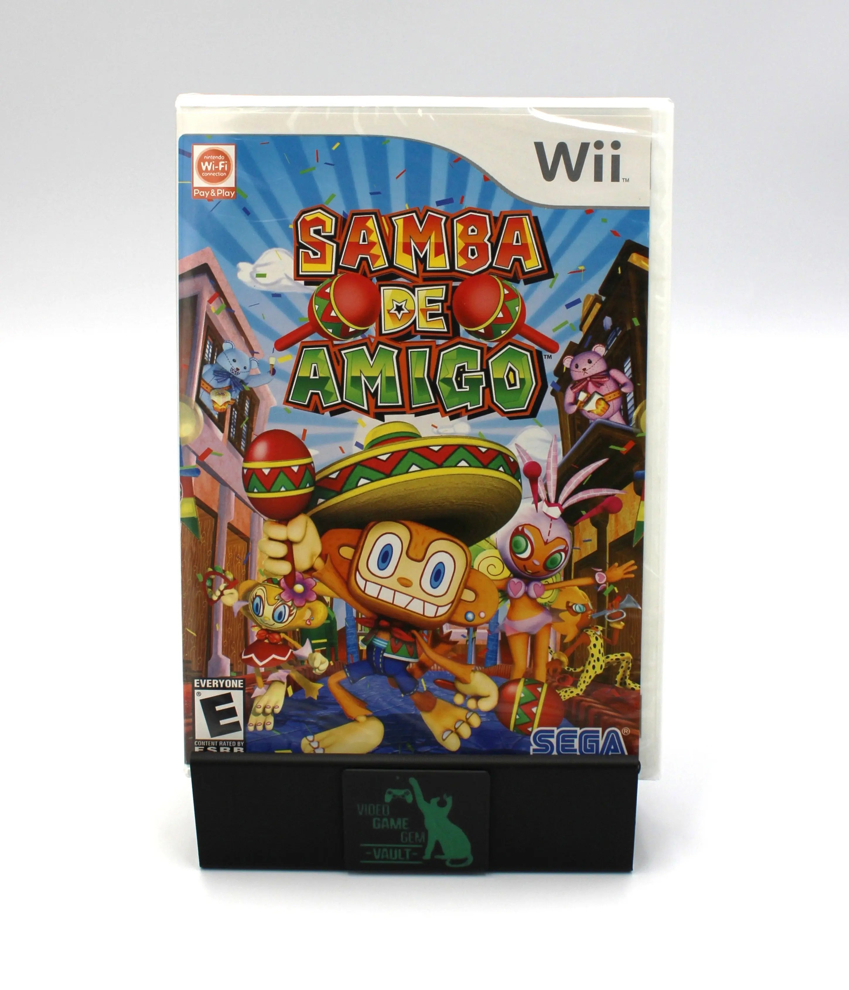  Front cover view of Samba de Amigo for Nintendo Wii – NTSC-U (2008), brand new and sealed in original factory packaging, showing vibrant artwork of Amigo and characters dancing in a colorful street scene. Shown is the Sega logo and E for Everyone ESRB game rating,