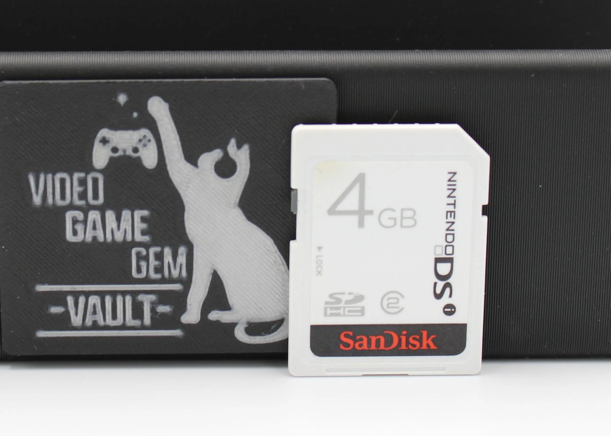 “Front of White SanDisk 4GB SDHC Memory Card for Nintendo DSi (OEM, 2010), showing intact label, SanDisk logo, and capacity.”