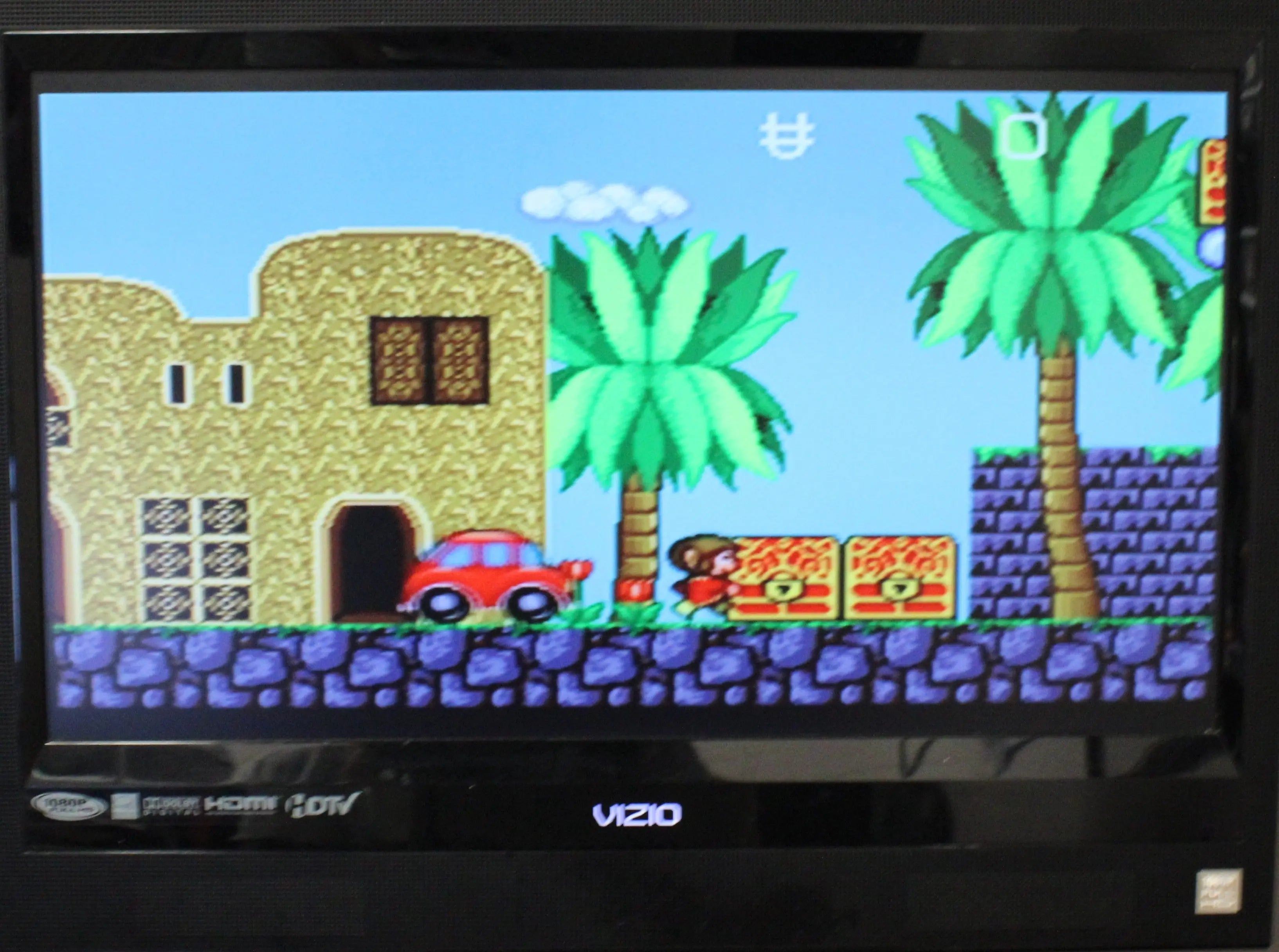 Gameplay screenshot of Sega Genesis Collection for Sony PlayStation 2 PS2 (2006), showing in-game action and visual style of Alex Kidd.