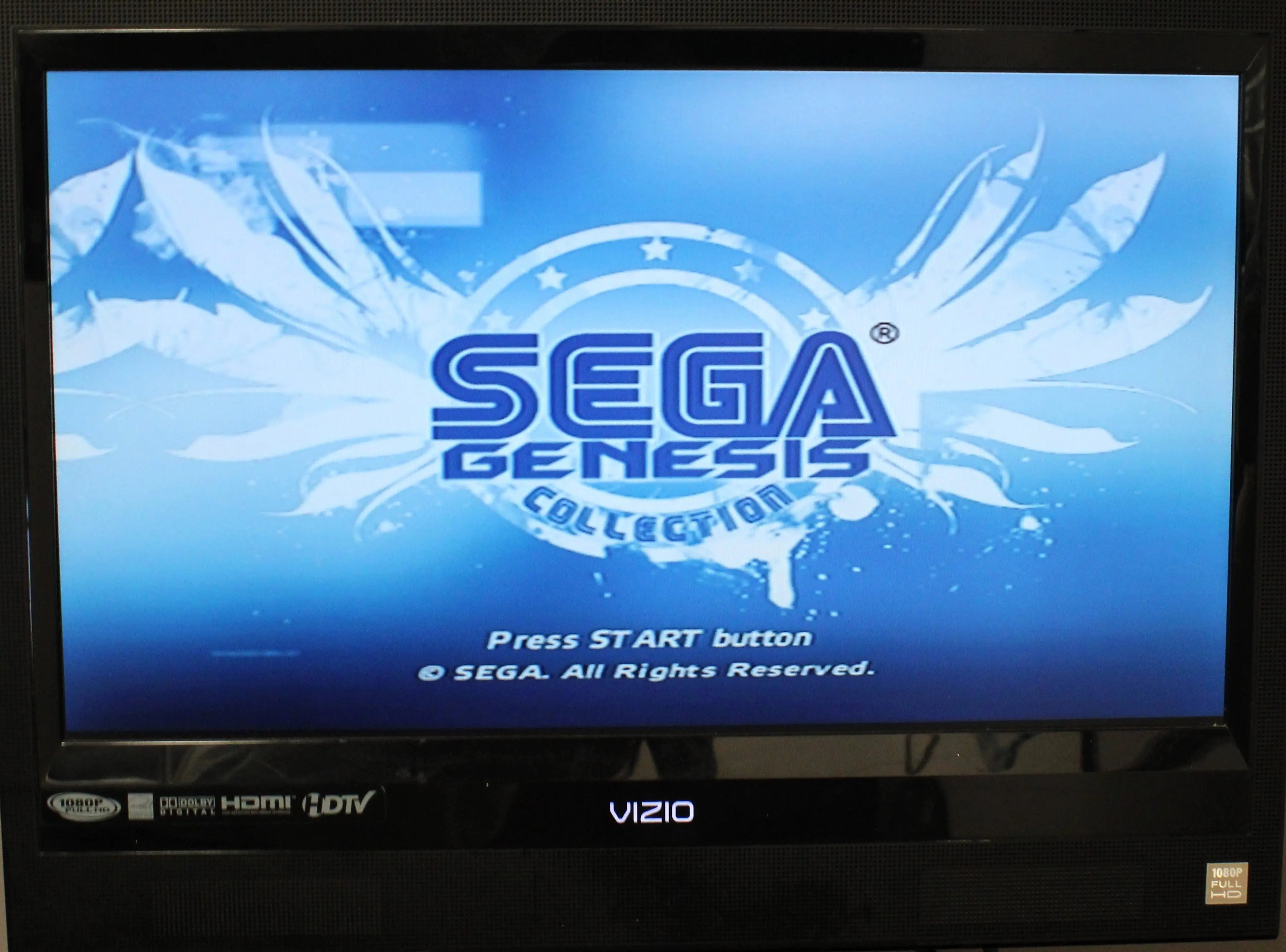 Gameplay screenshot of Sega Genesis Collection for Sony PlayStation 2 PS2 (2006), showing main menu image with title text and press start option.