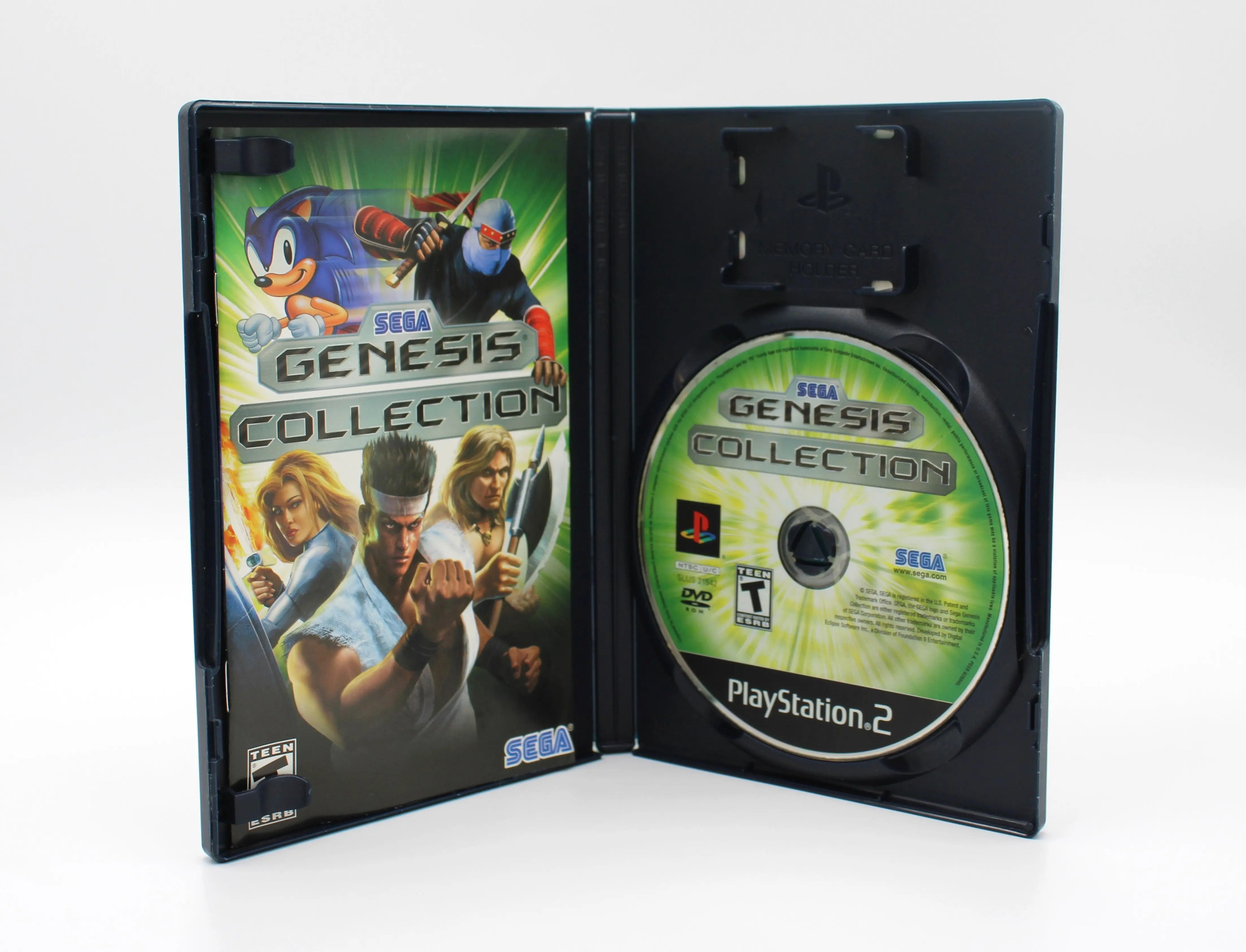 Open case image of Sega Genesis Collection for Sony PlayStation 2 PS2 (2006), showing manual and game disc, NTSC-U edition.
